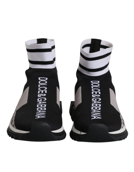 Pair of black, gray, and white sock-style sneakers with brand name on side