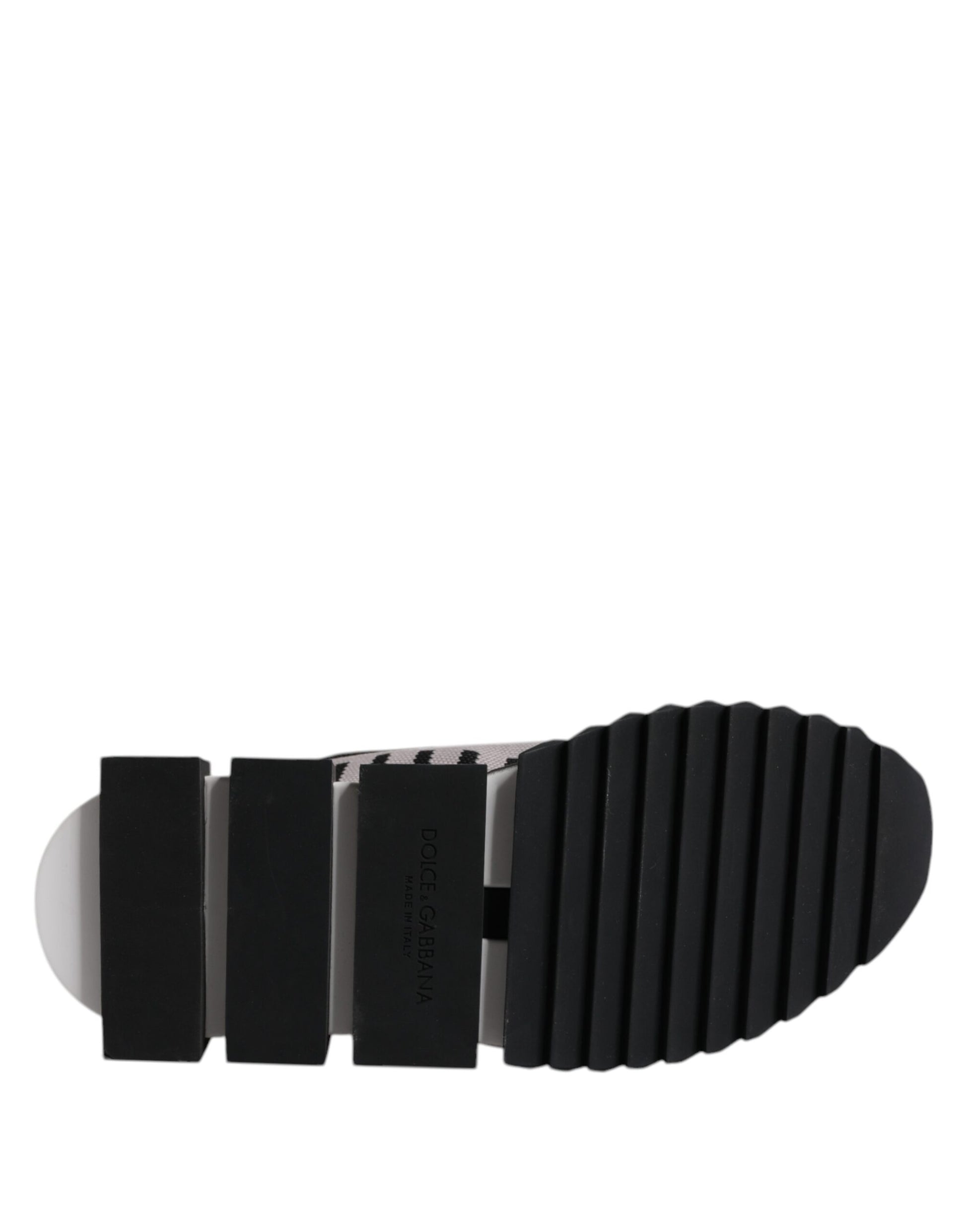 A black and gray women's shoe with a textured sole