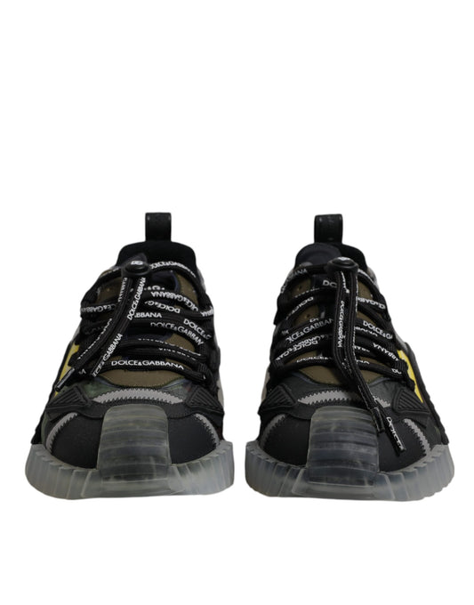 Pair of black sneakers with white laces