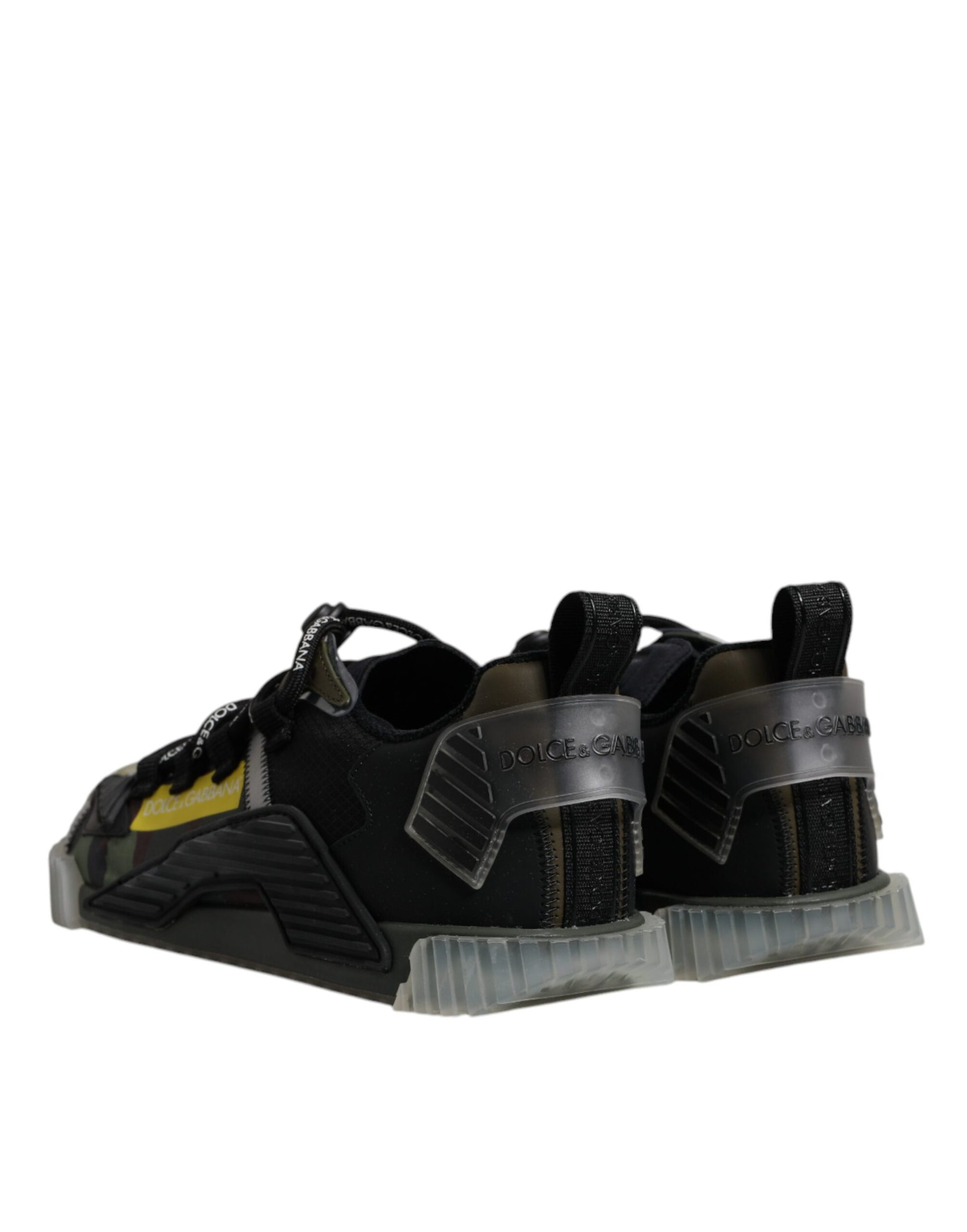 Pair of black and yellow children's shoes with straps for secure fit