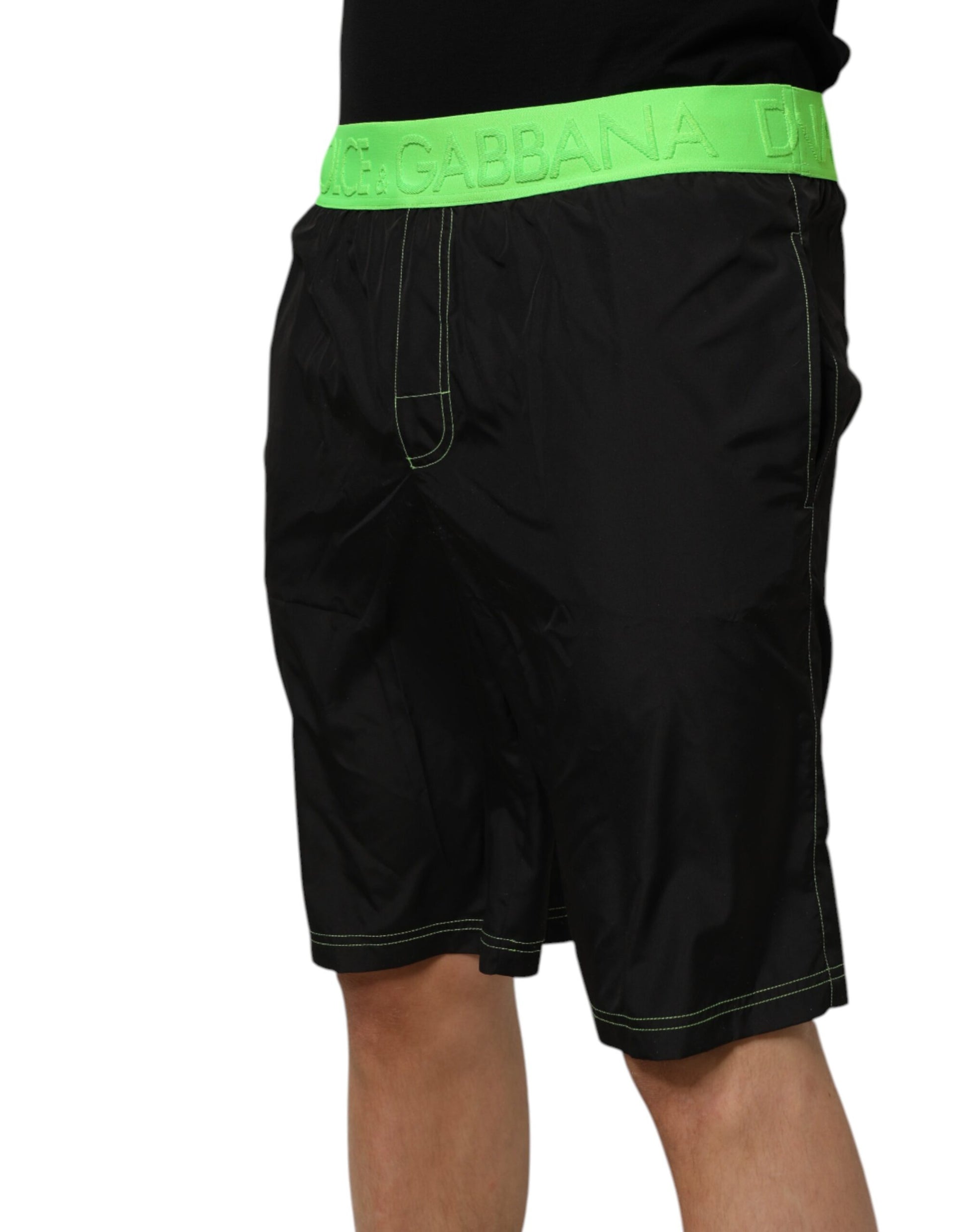 Black shorts with green trim