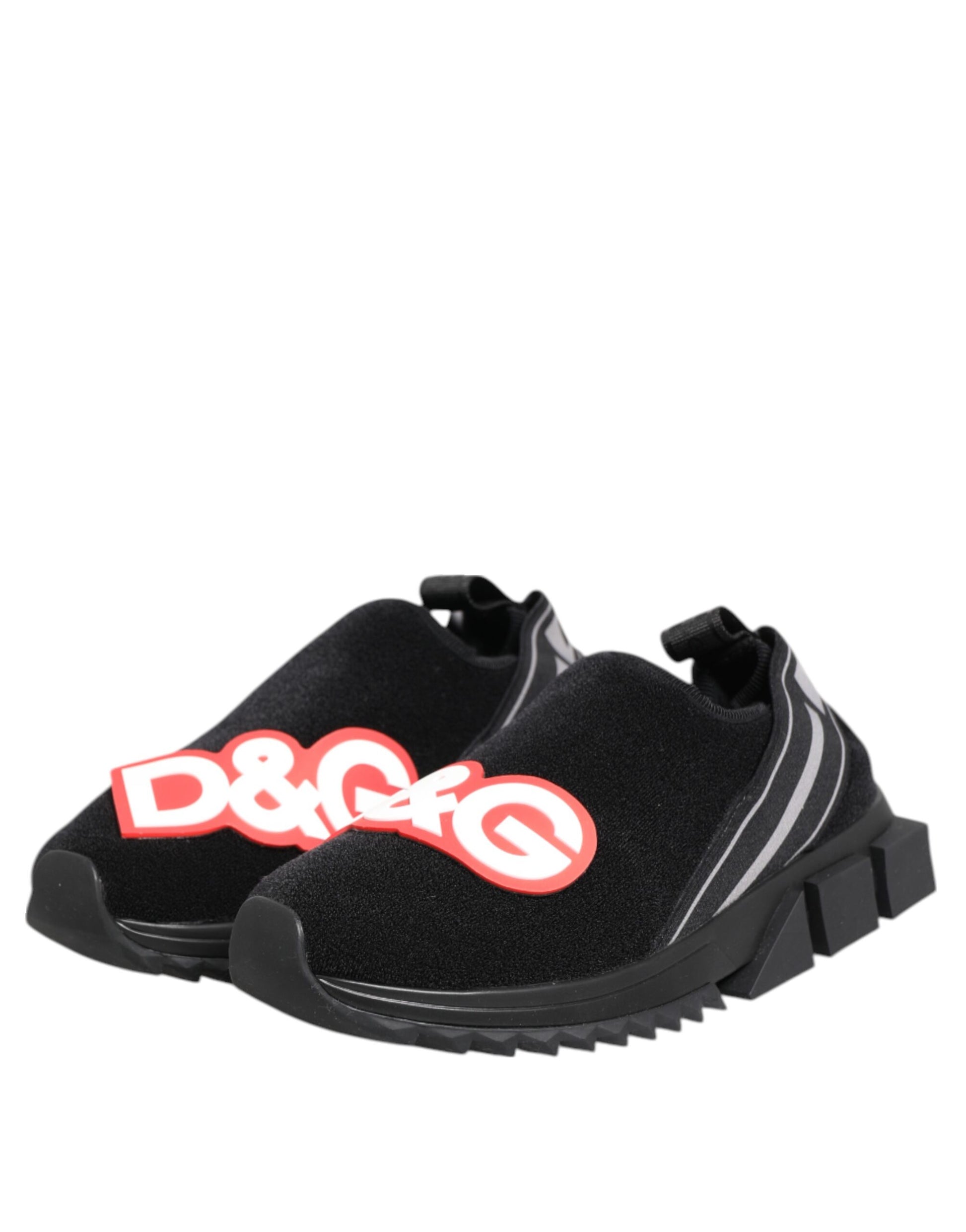 Pair of black slippers with red logo on soles
