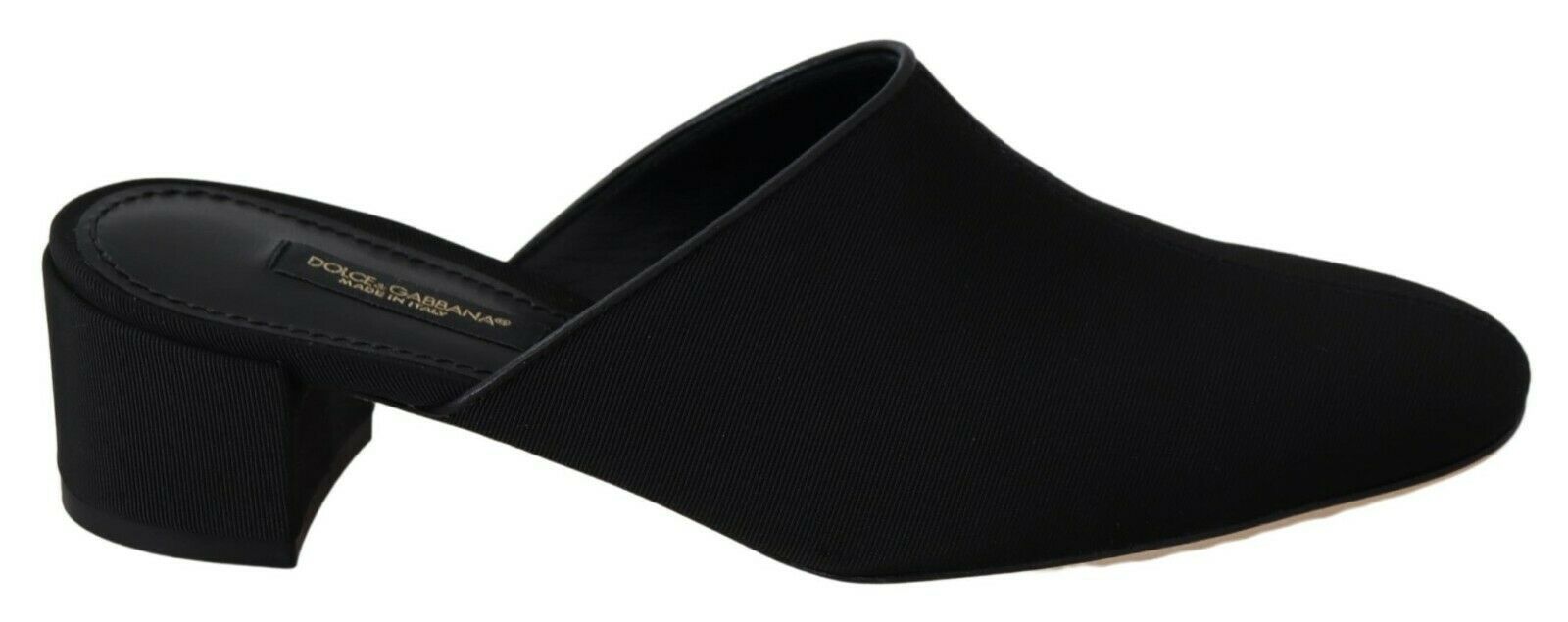 Black flat shoes with a strap over the foot and a heel