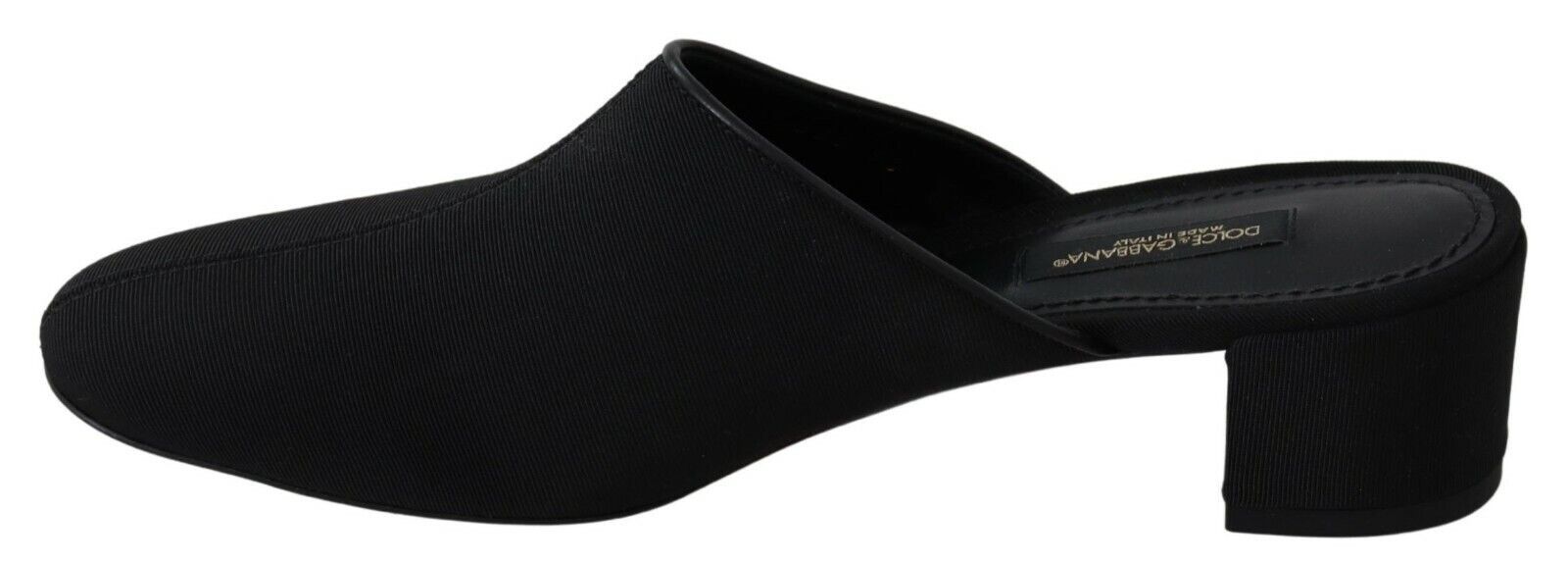 Pair of black loafers with a patterned sole