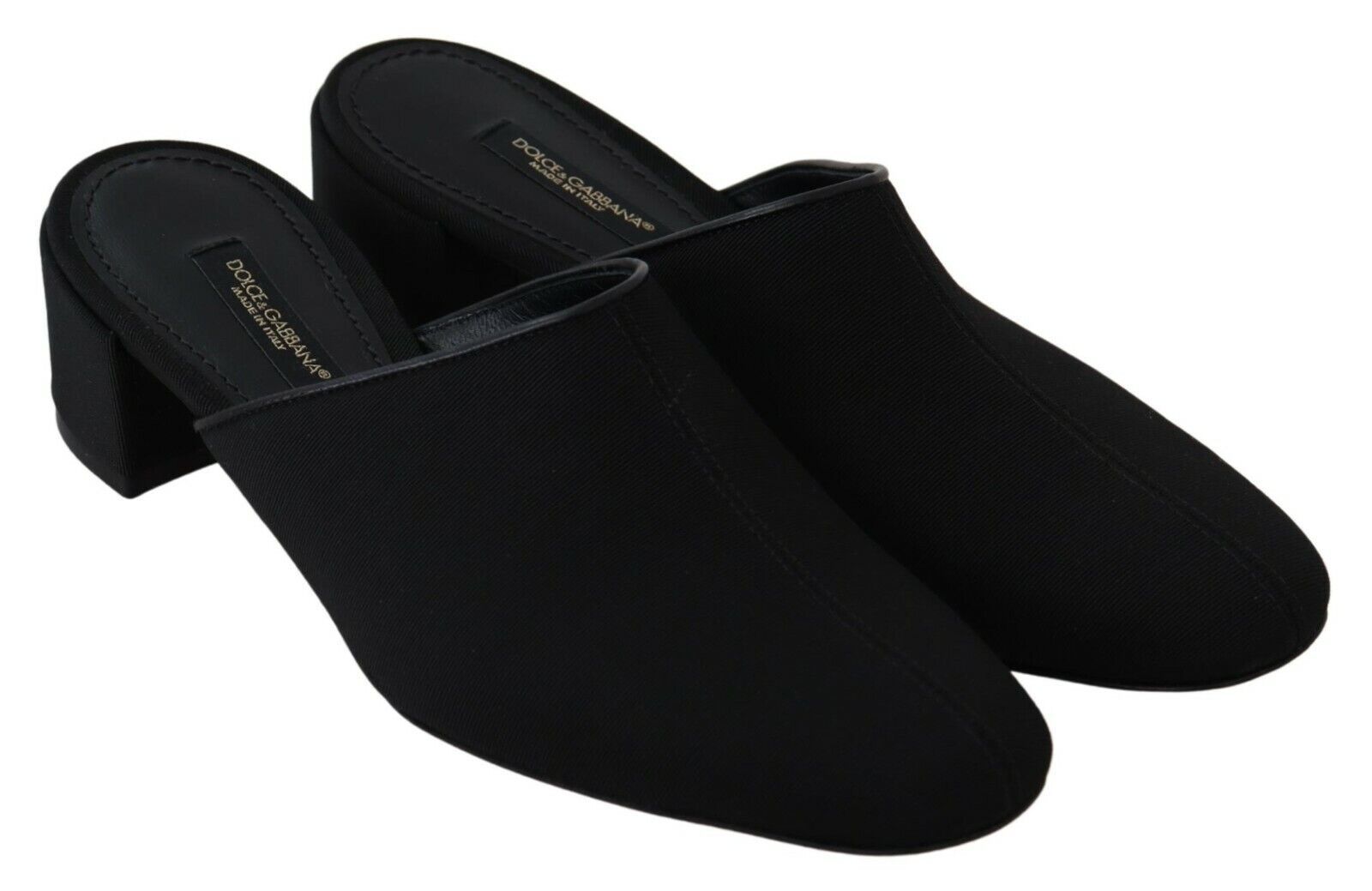 Pair of black flat shoes with a strap across the foot