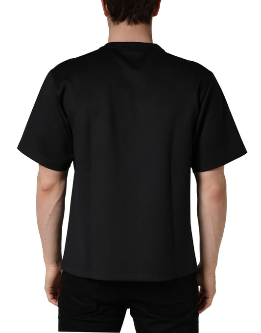 Black short sleeve shirt on a mannequin