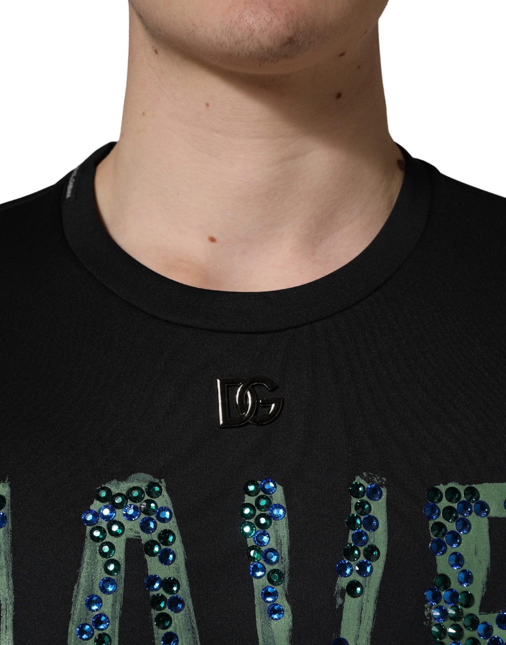 Black shirt with sparkly letters and a zipper