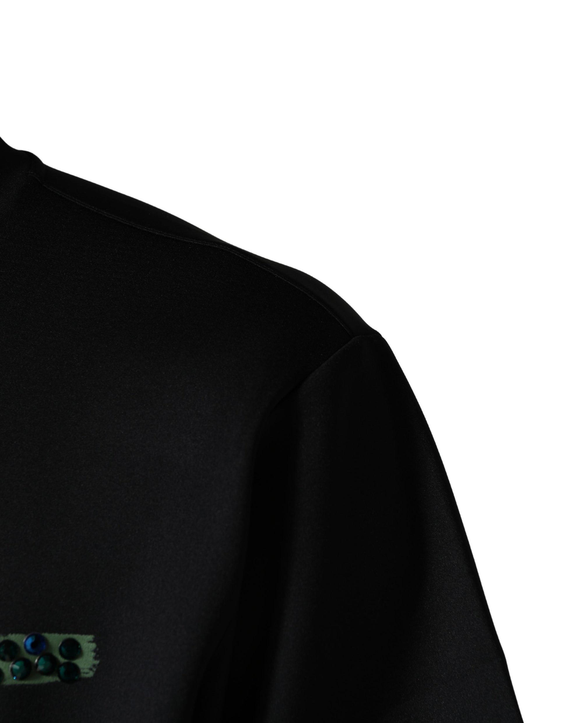 Black long sleeve shirt with a small embroidered design on the left chest area