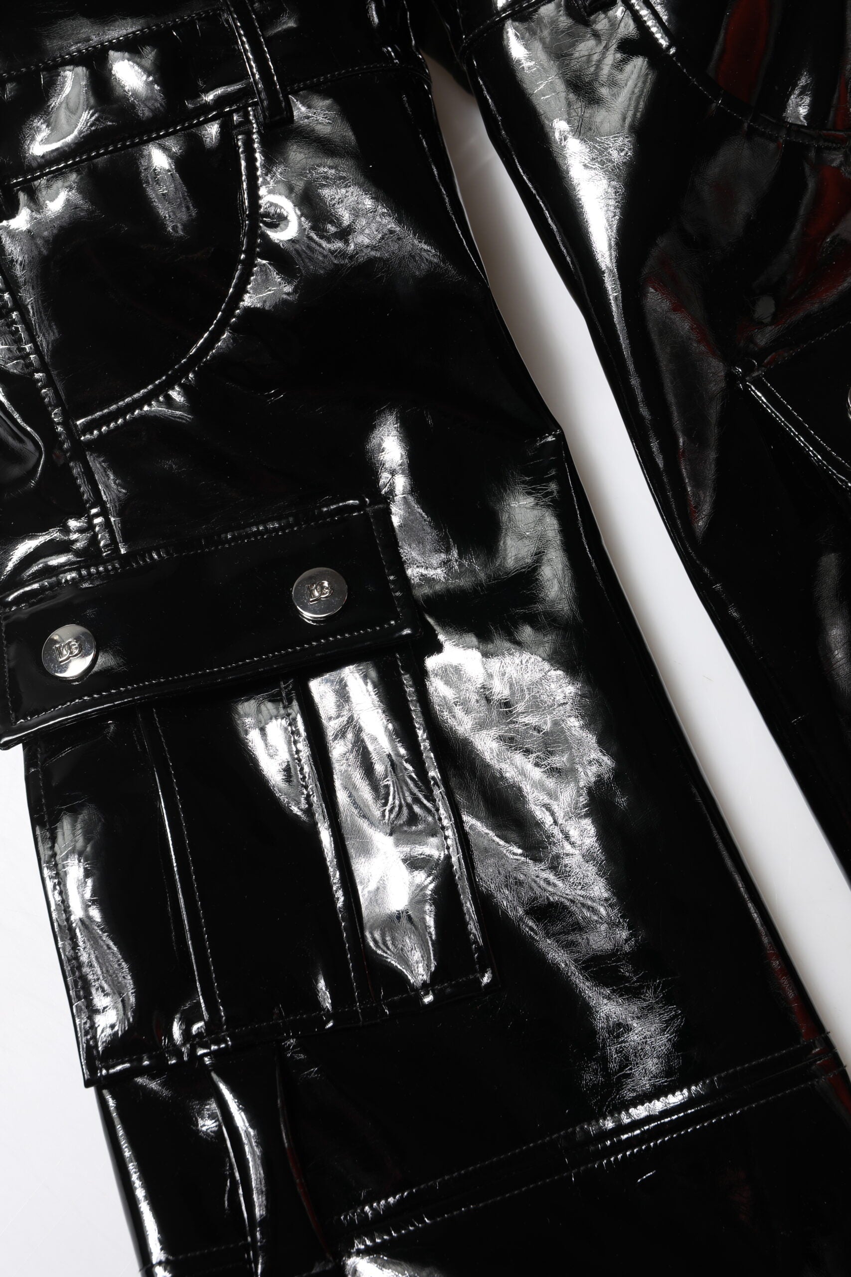 Black leather pants with silver buttons