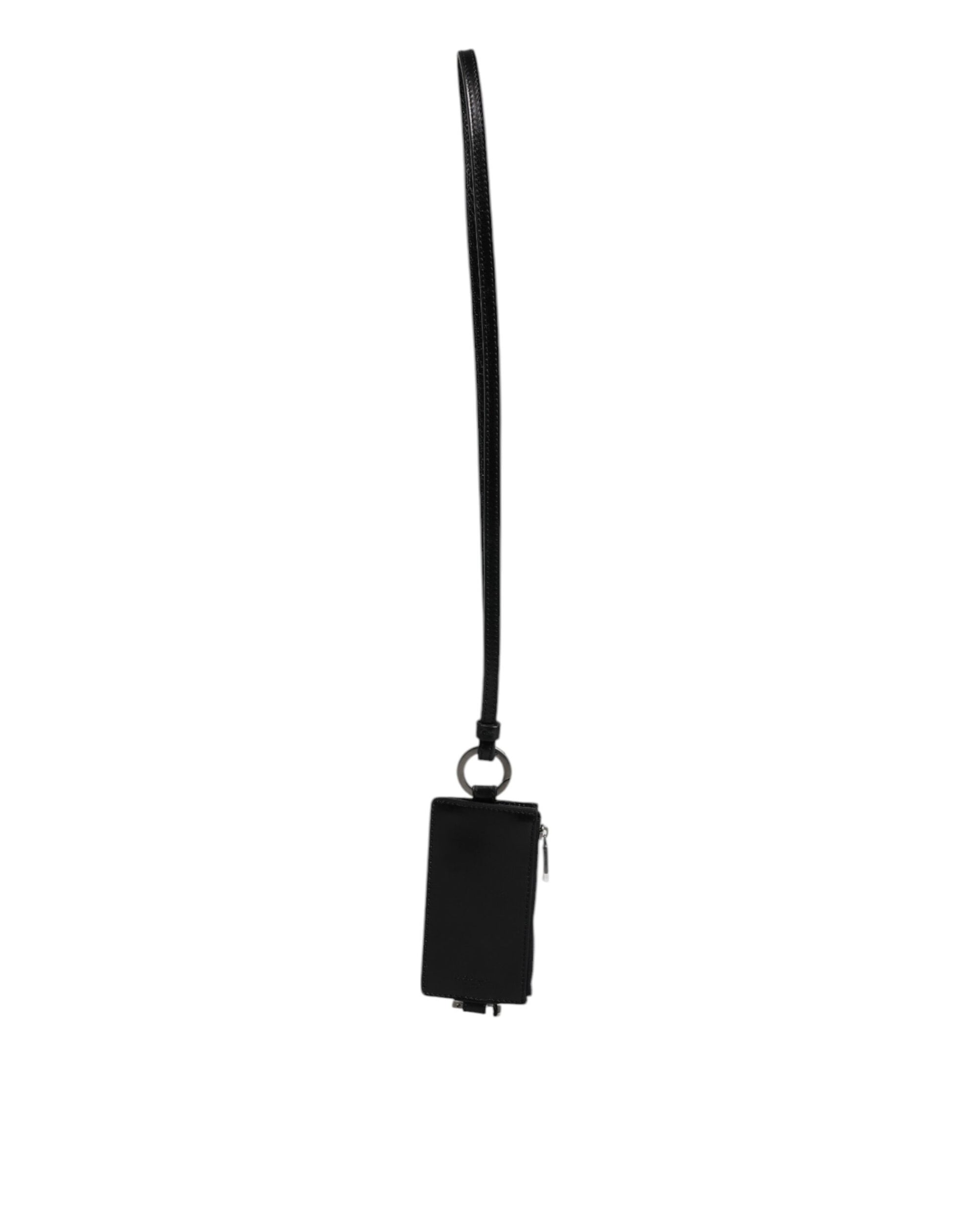 Black lanyard with a keychain attached to it