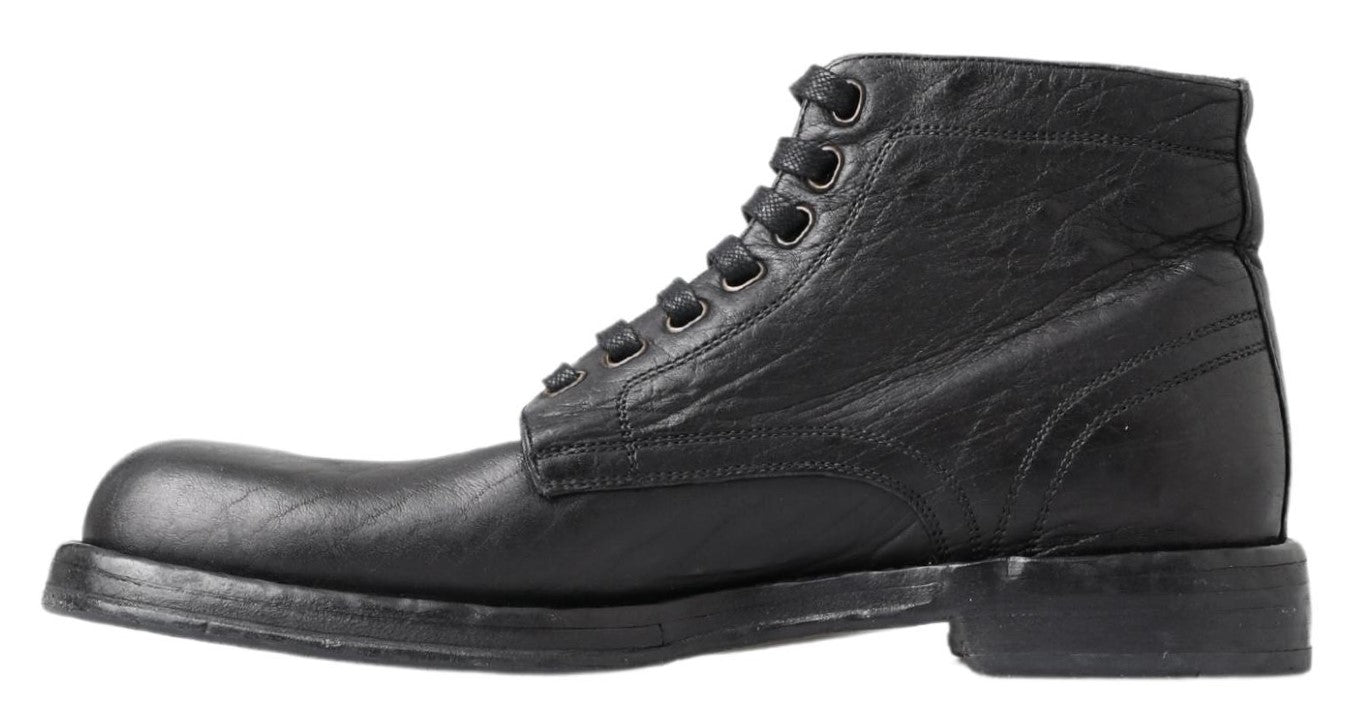 Black leather lace-up boot with visible stitching and a low heel