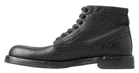 Black leather lace-up boot with visible stitching and a low heel