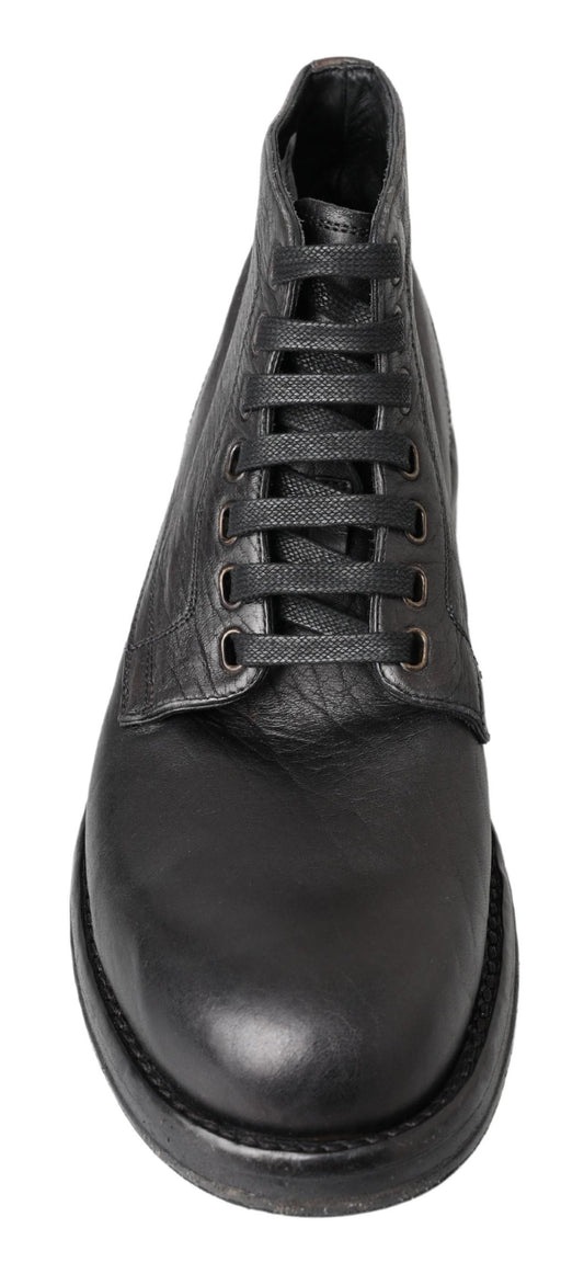 Black leather lace-up boot with stitched detailing and a low heel