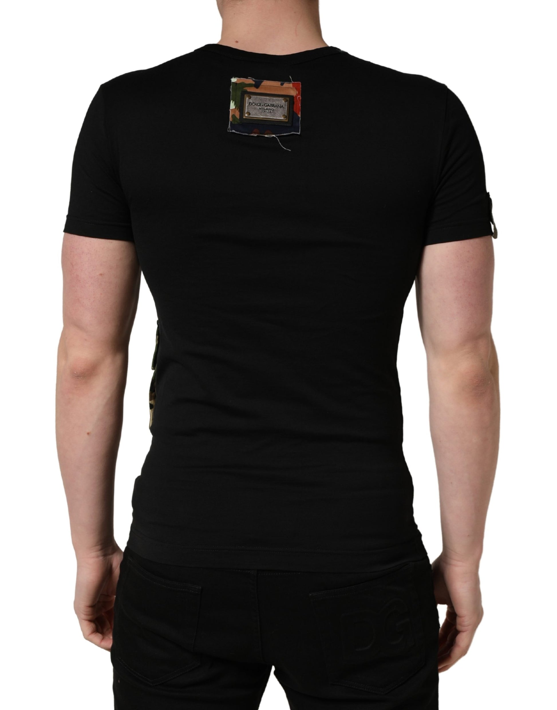 Black t-shirt with a small rectangular tag on the back