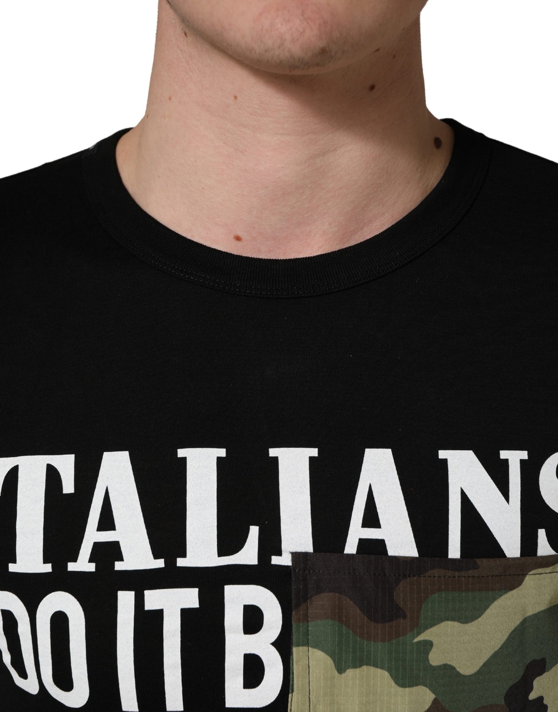 Man wearing black shirt with white lettering
