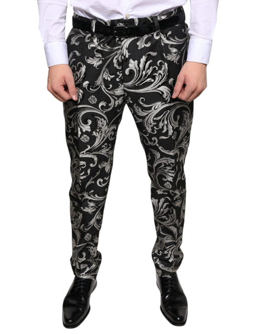 A pair of black jacquard skinny dress pants with a floral pattern