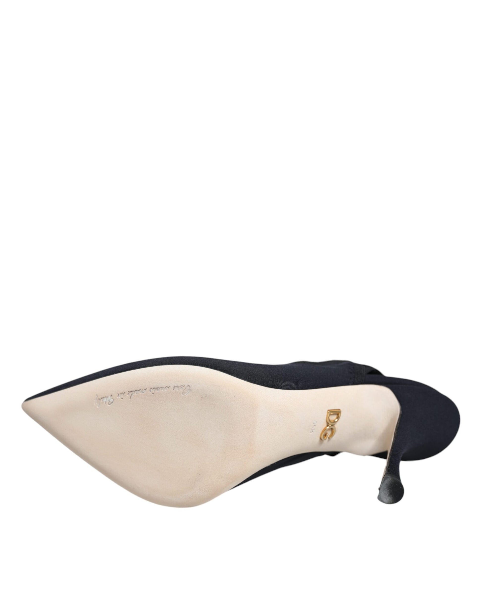 Tan high heel shoe with black strap