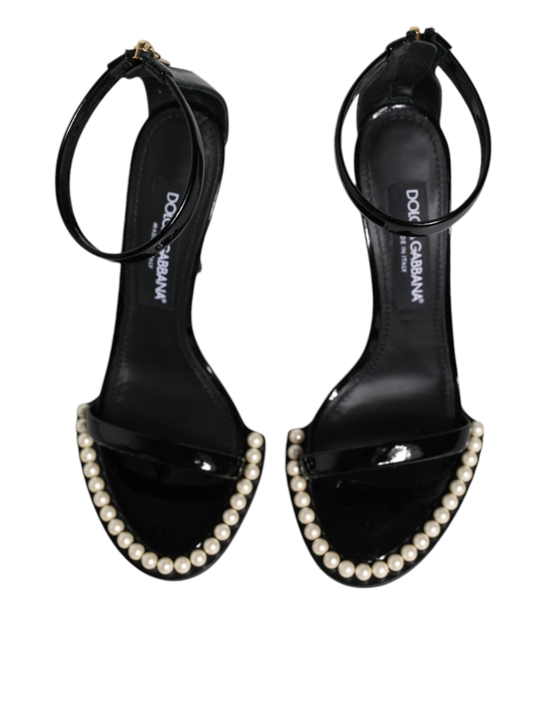 Black high heel shoes with pearl embellishments on straps