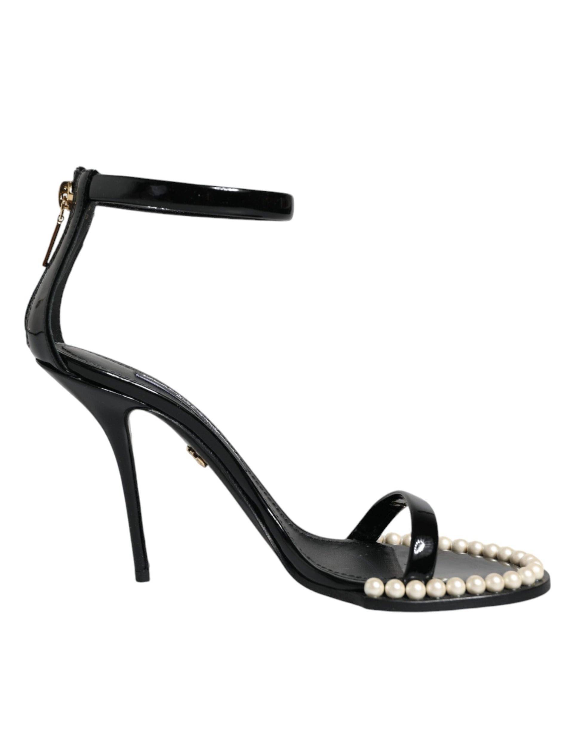 Black high heel shoe with pearl embellishments on toe