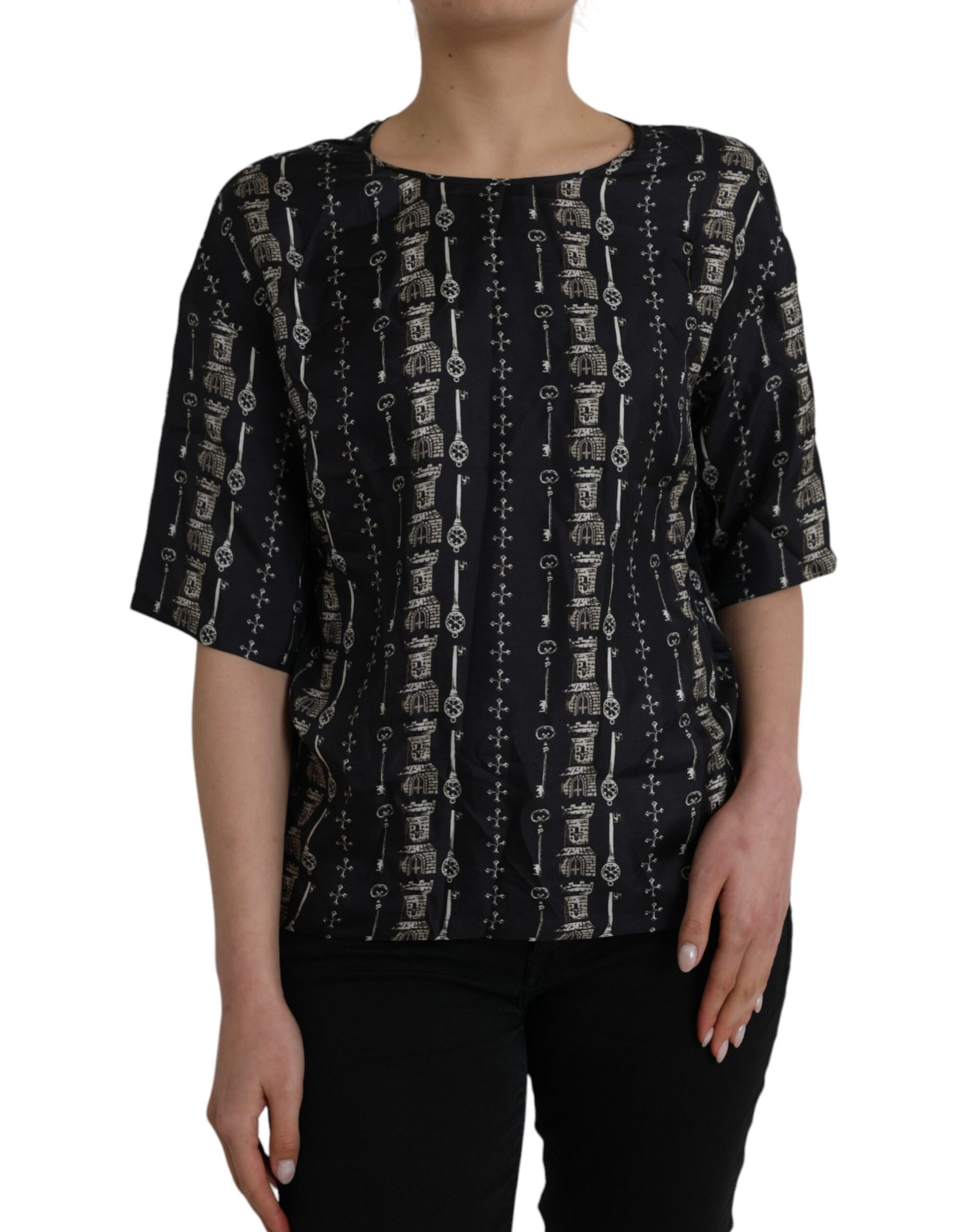 Black top with patterned design on front
