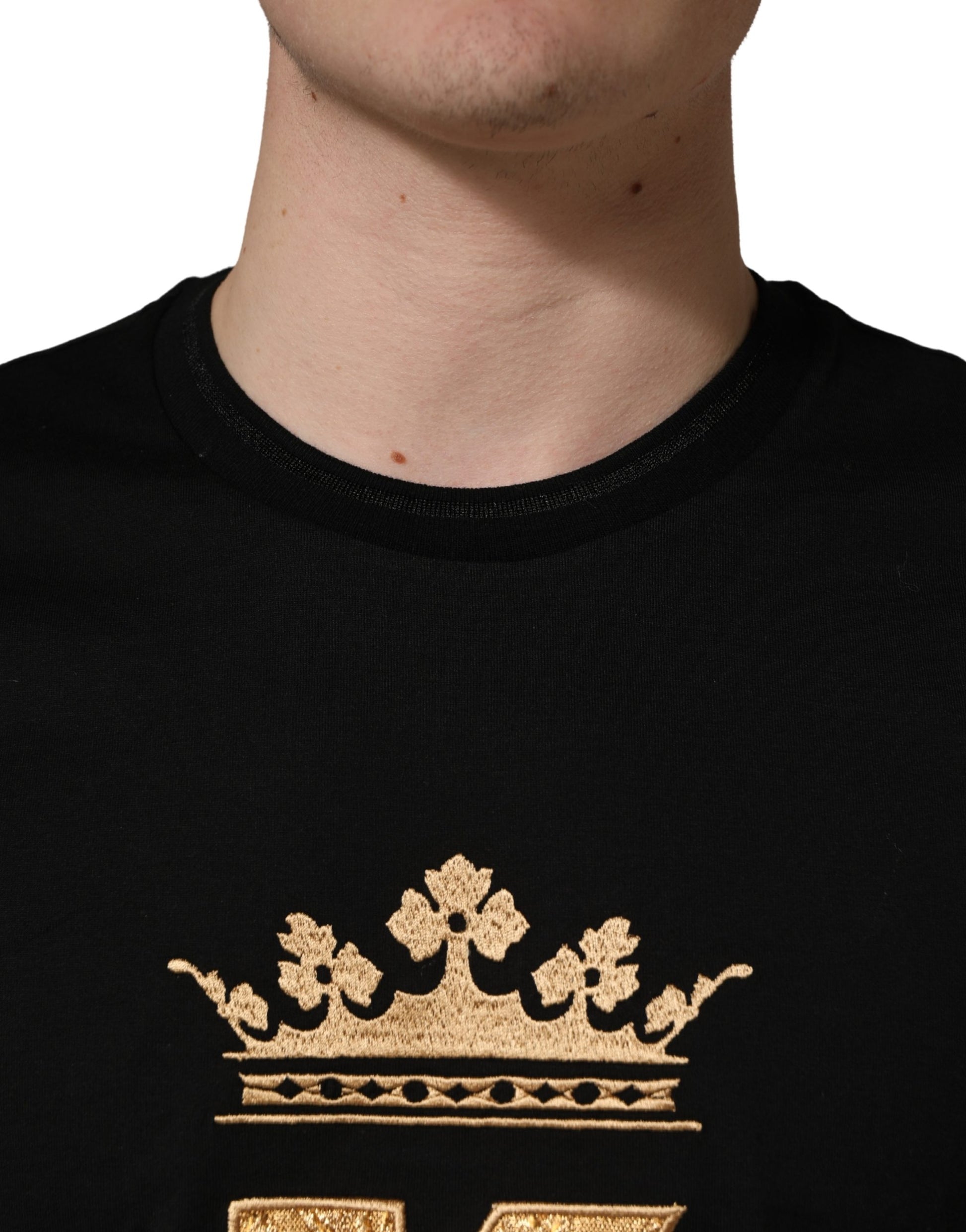 Black shirt with gold crown emblem