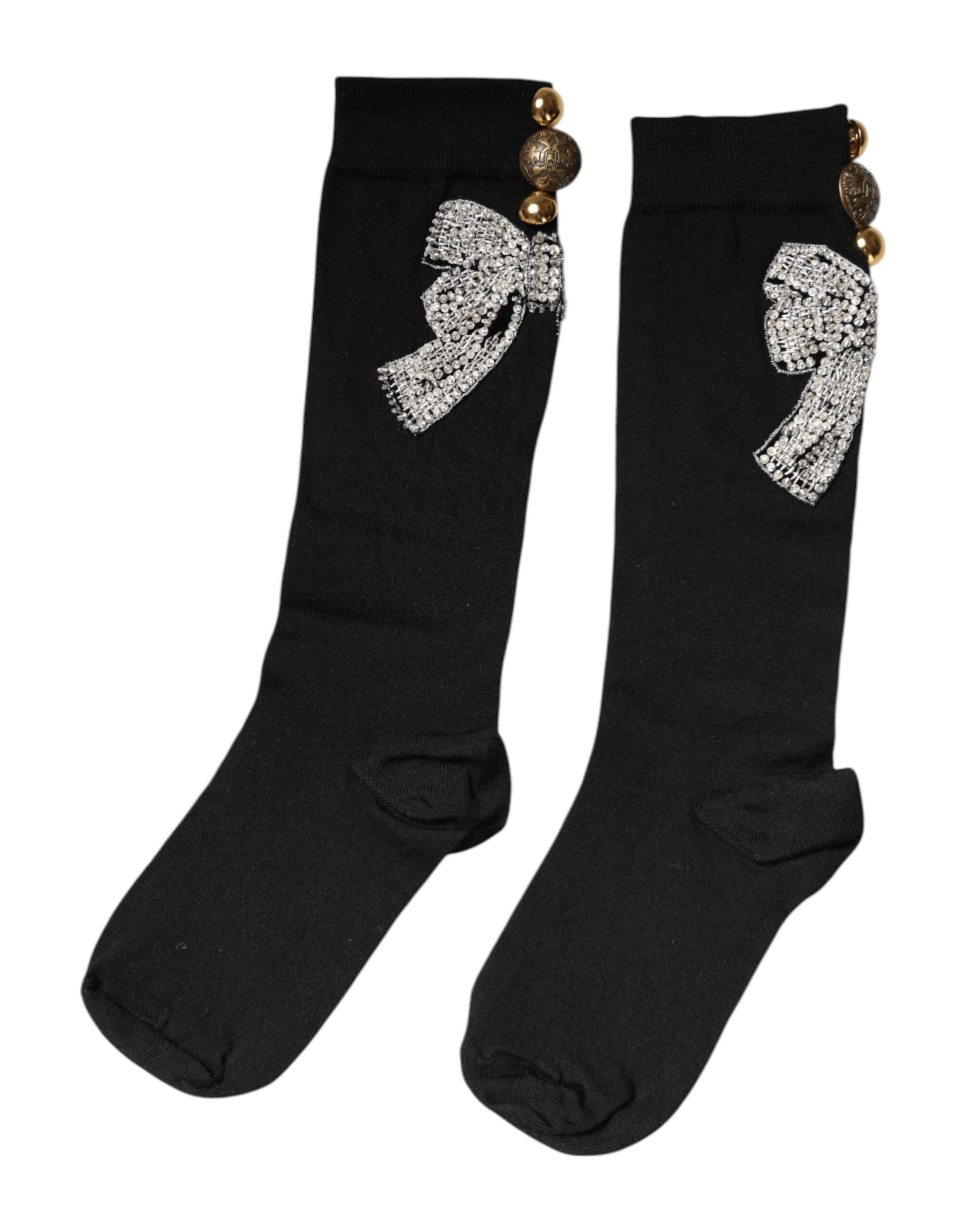 Pair of black socks with bow embellishments
