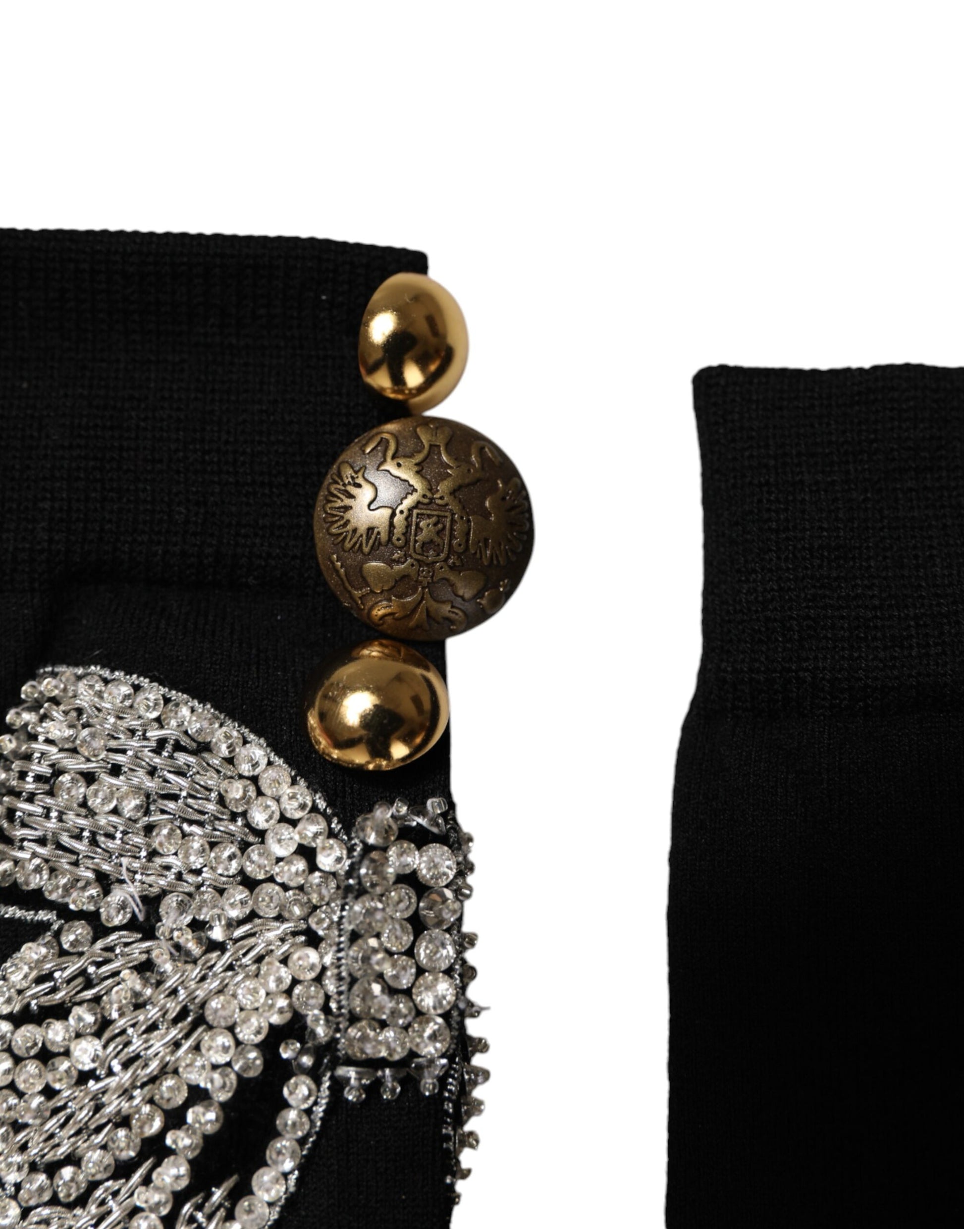 Black garment with gold beads and sequins