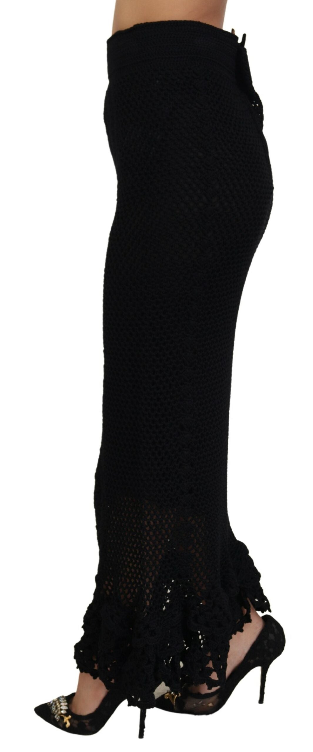 Pair of black high heel shoes with embellishments