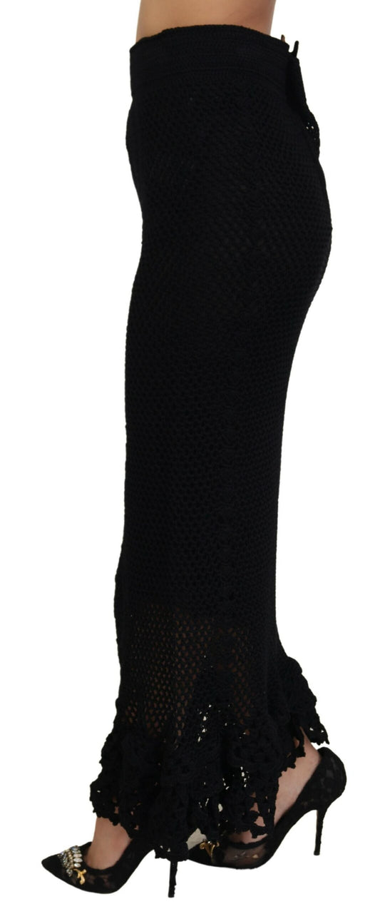 Pair of black high heel shoes with embellishments