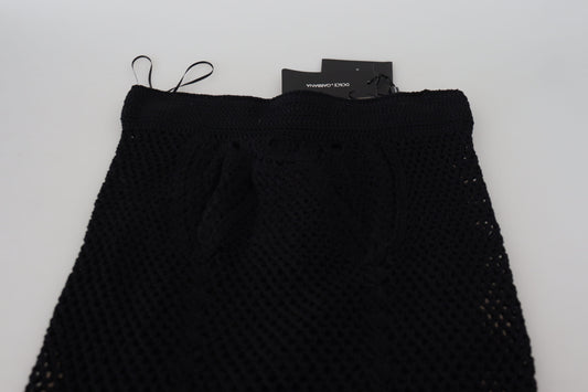Black lace shorts on a white surface