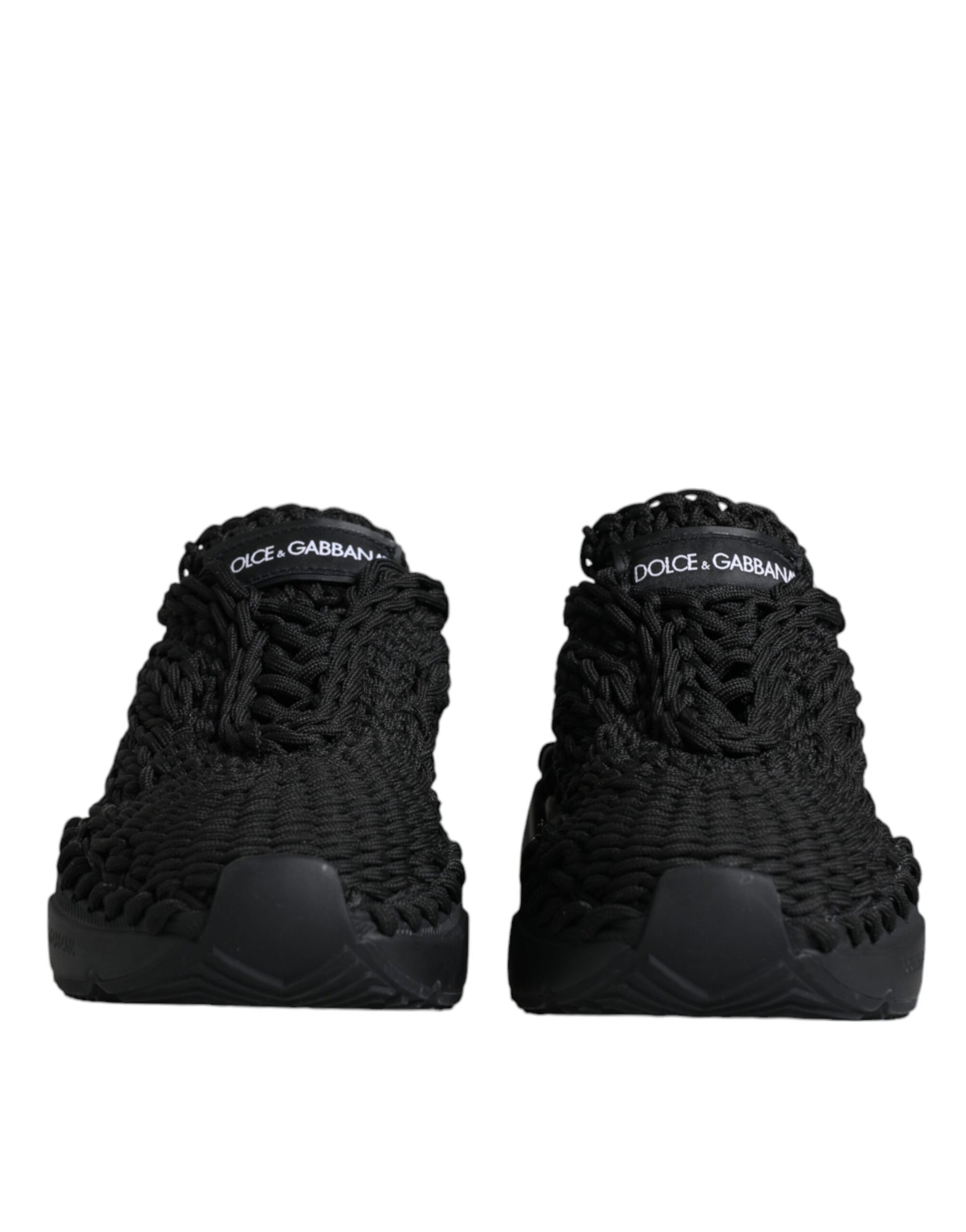 Pair of black high top sneakers with white logo on side