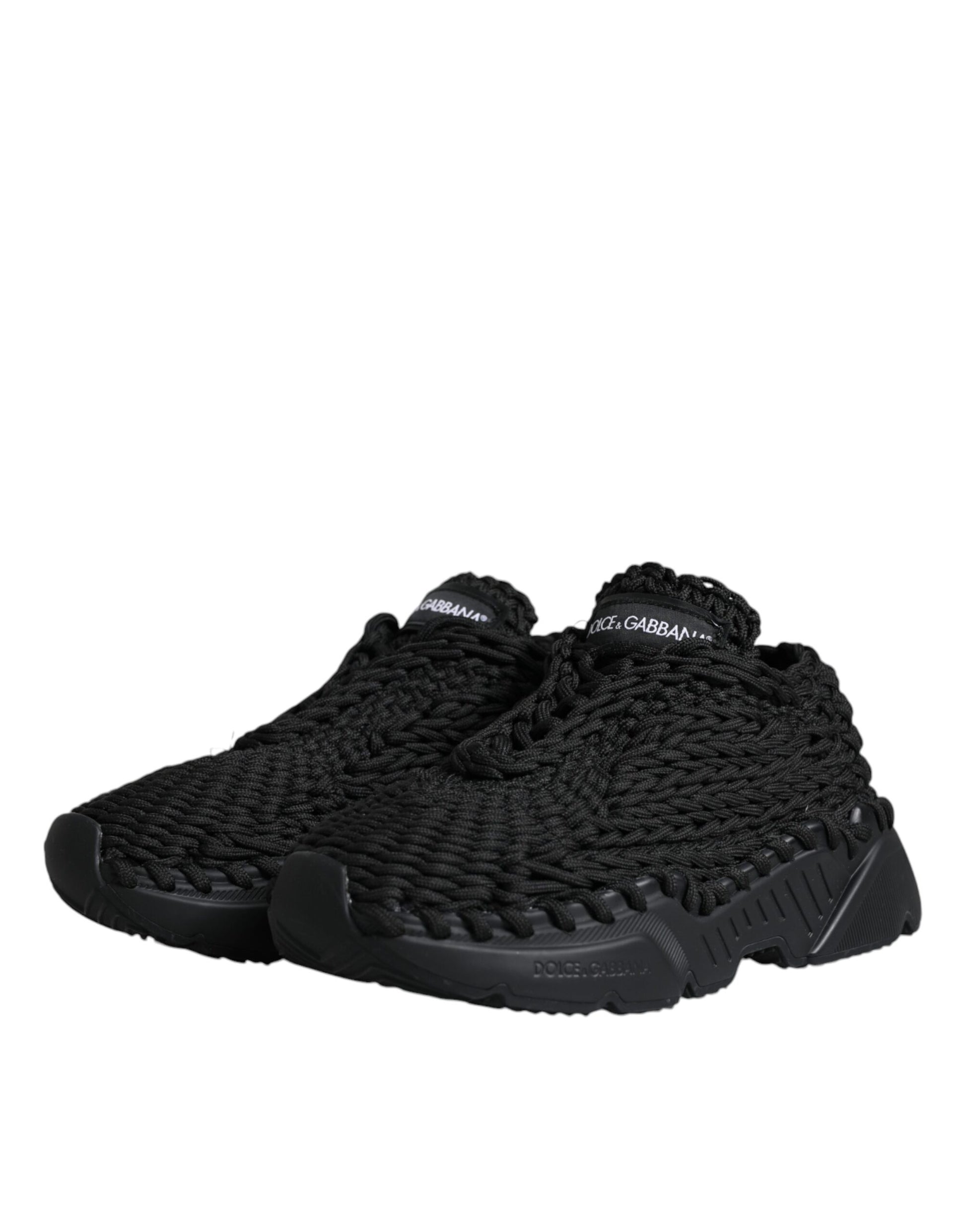 Black sneakers with a knit texture and white soles
