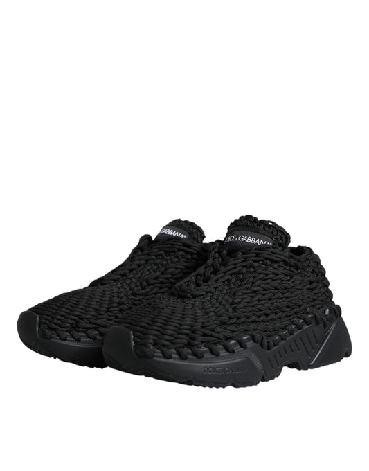 Black sneakers with a knit texture and white soles