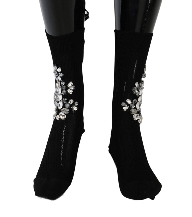 Pair of black socks with silver sequins on top