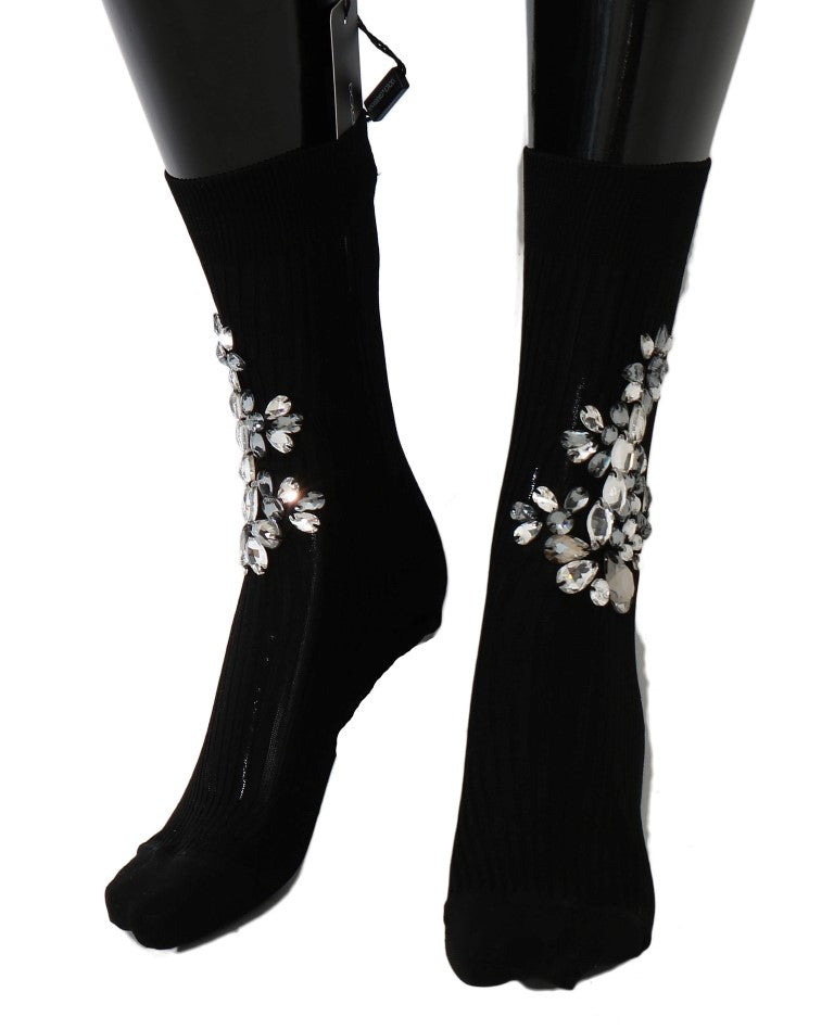 Pair of black socks with sparkling embellishments on top