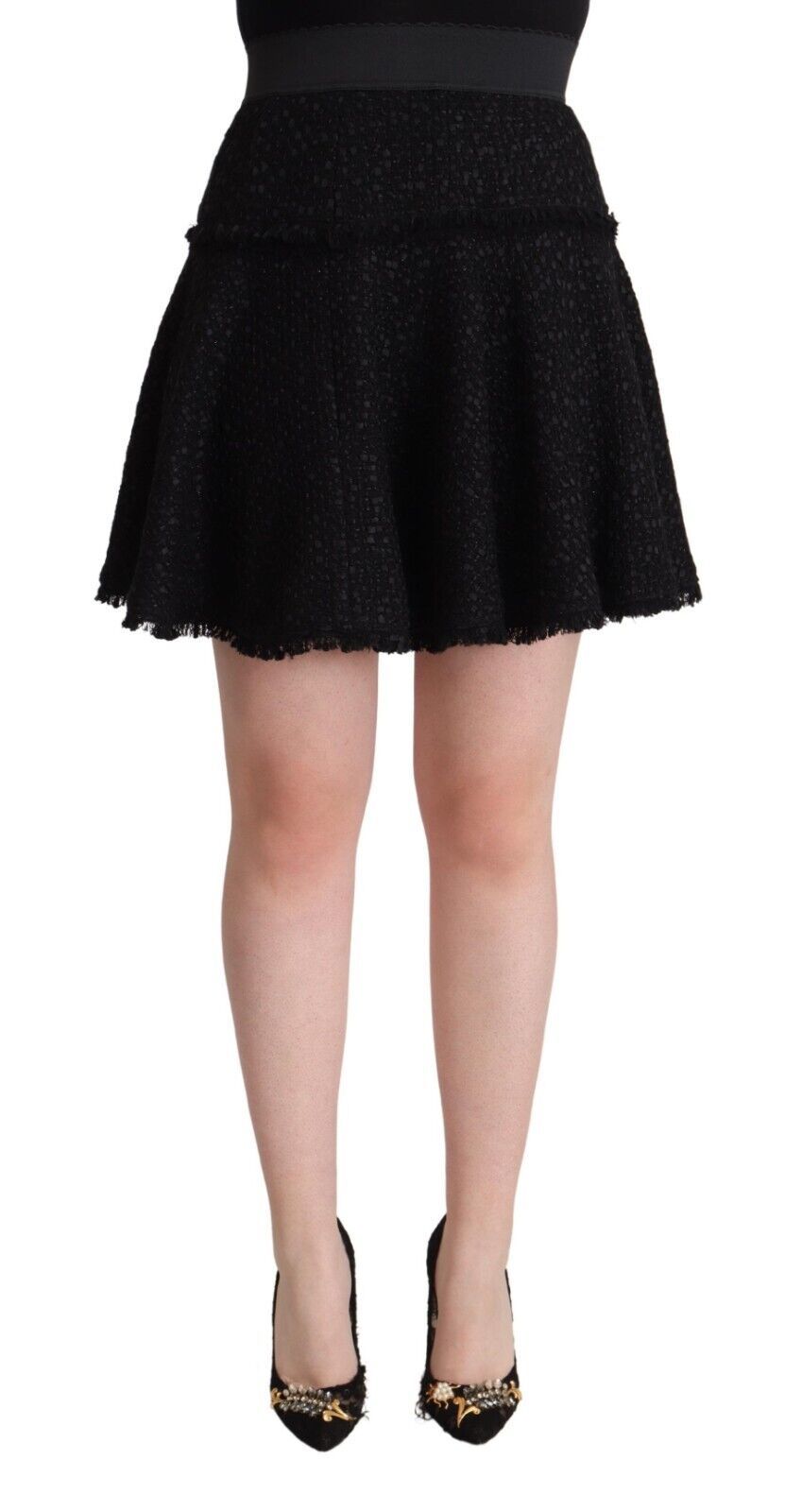 Black sequined dress with short skirt and high heels