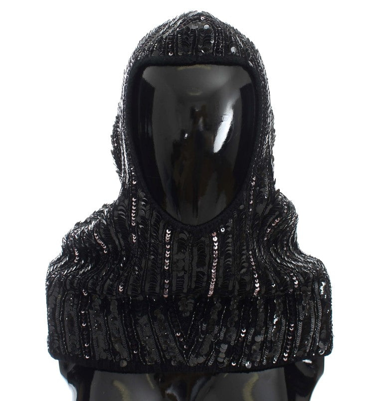 Black hooded garment with sequins on mannequin