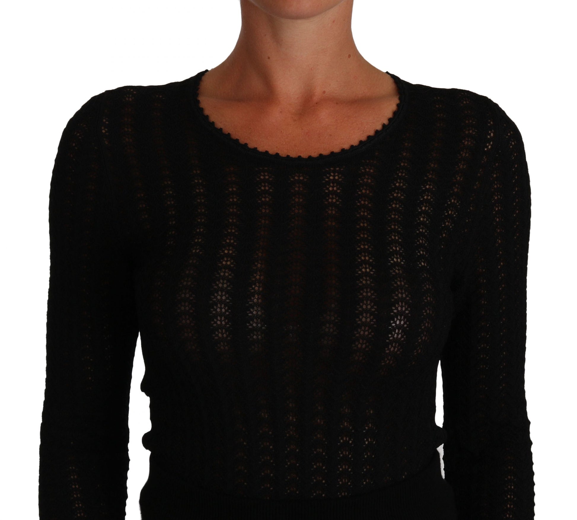 A black knit dress with long sleeves and a sheath style