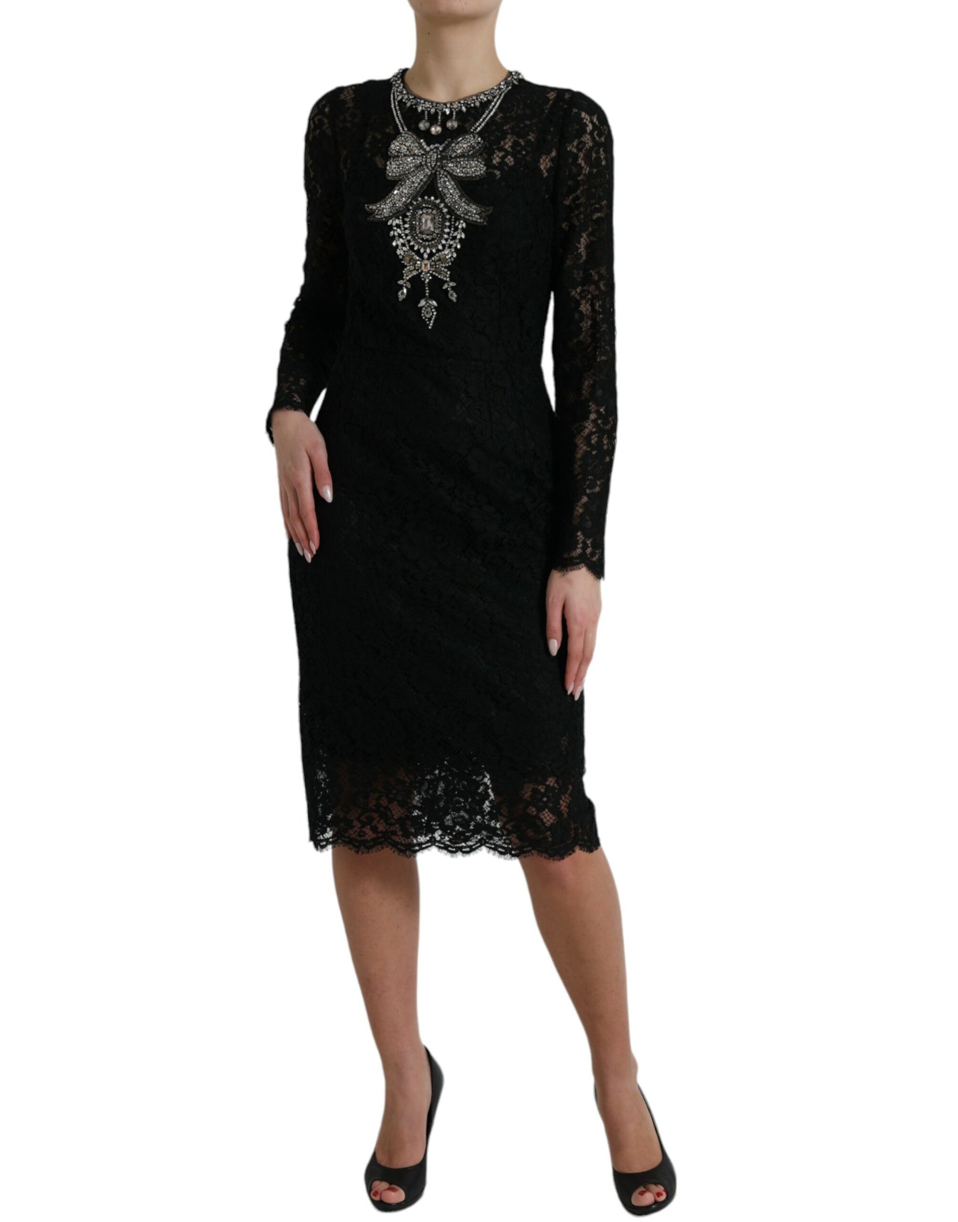 A black lace dress with crystal embellishments, featuring a sheath silhouette