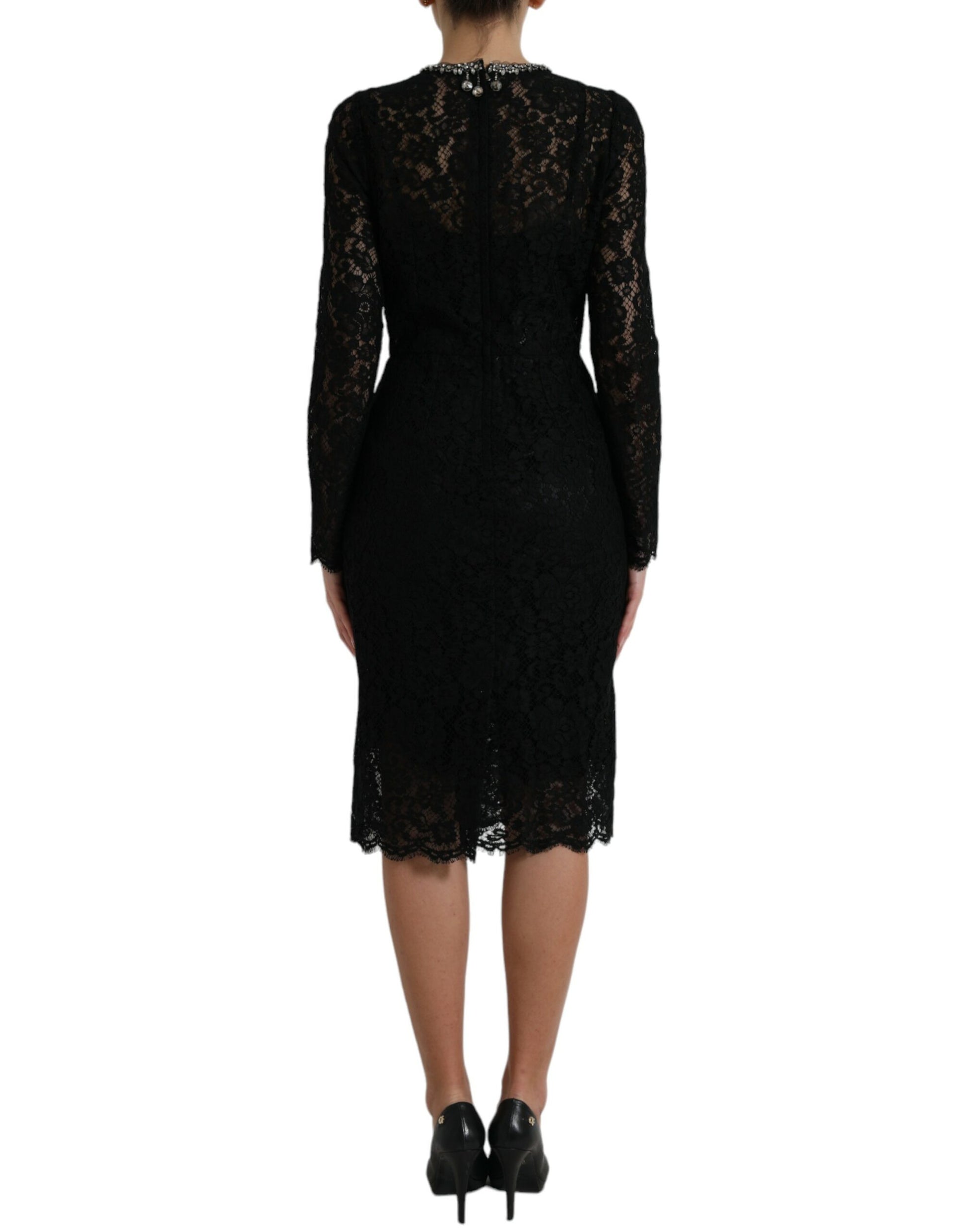 A black lace dress with crystal embellishments, featuring a sheath silhouette