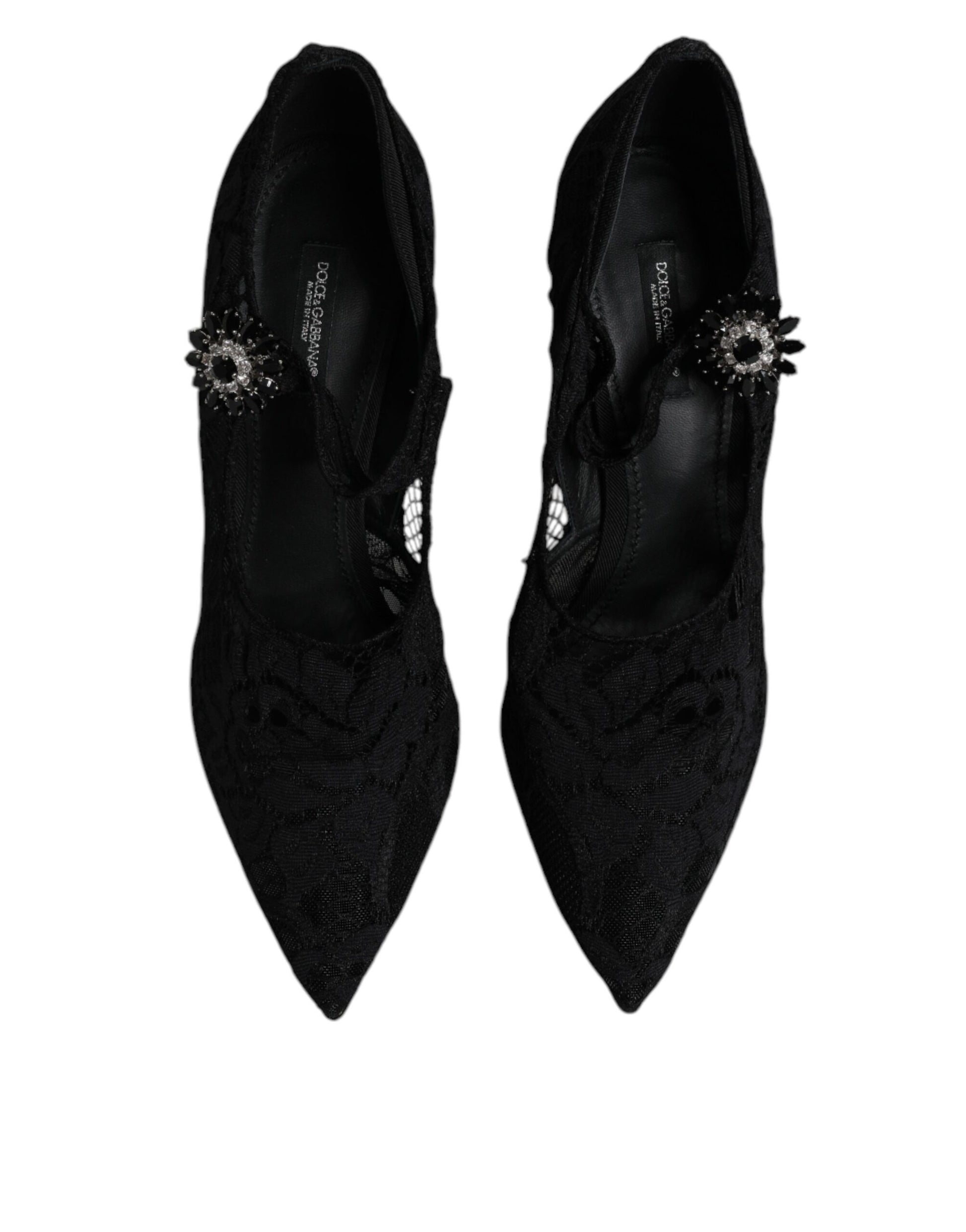 Pair of black high heel shoes with embellishments on top