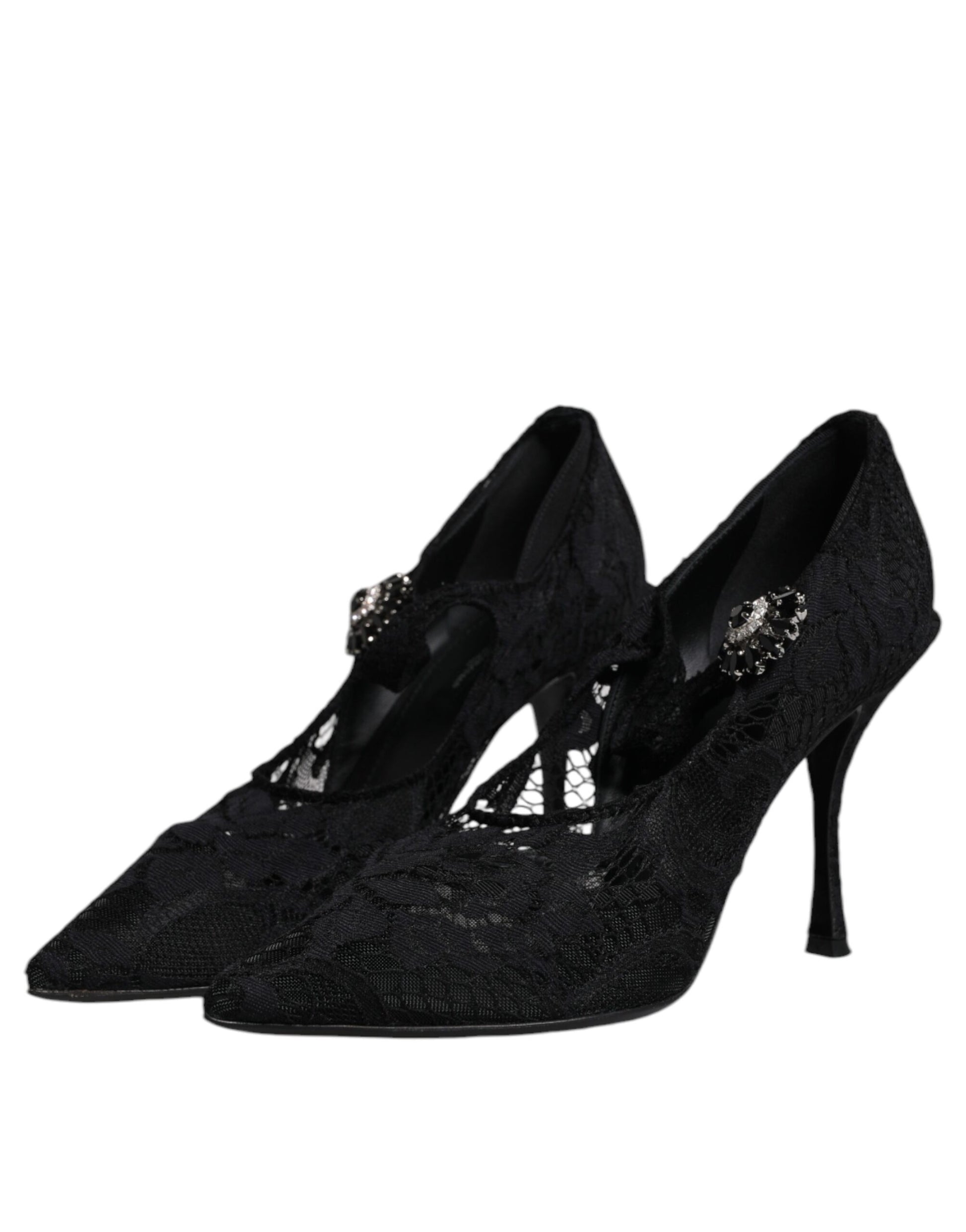 Pair of black high heel shoes with embellishments on toes
