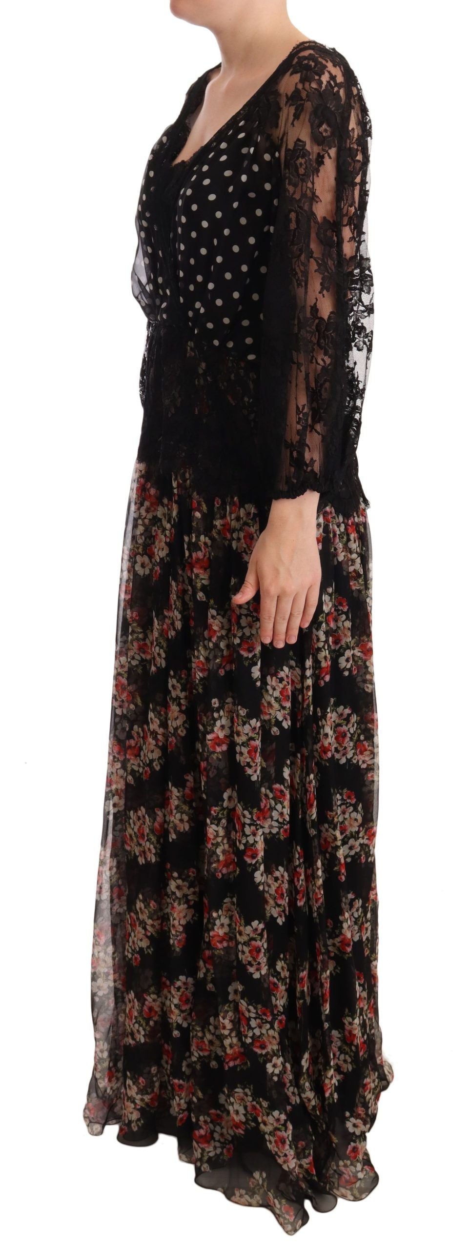 A long black lace dress with floral polka dots and a high neckline