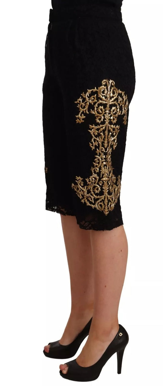 A pair of black lace shorts with gold baroque design, part of a special collection by Dolce & Gabbana