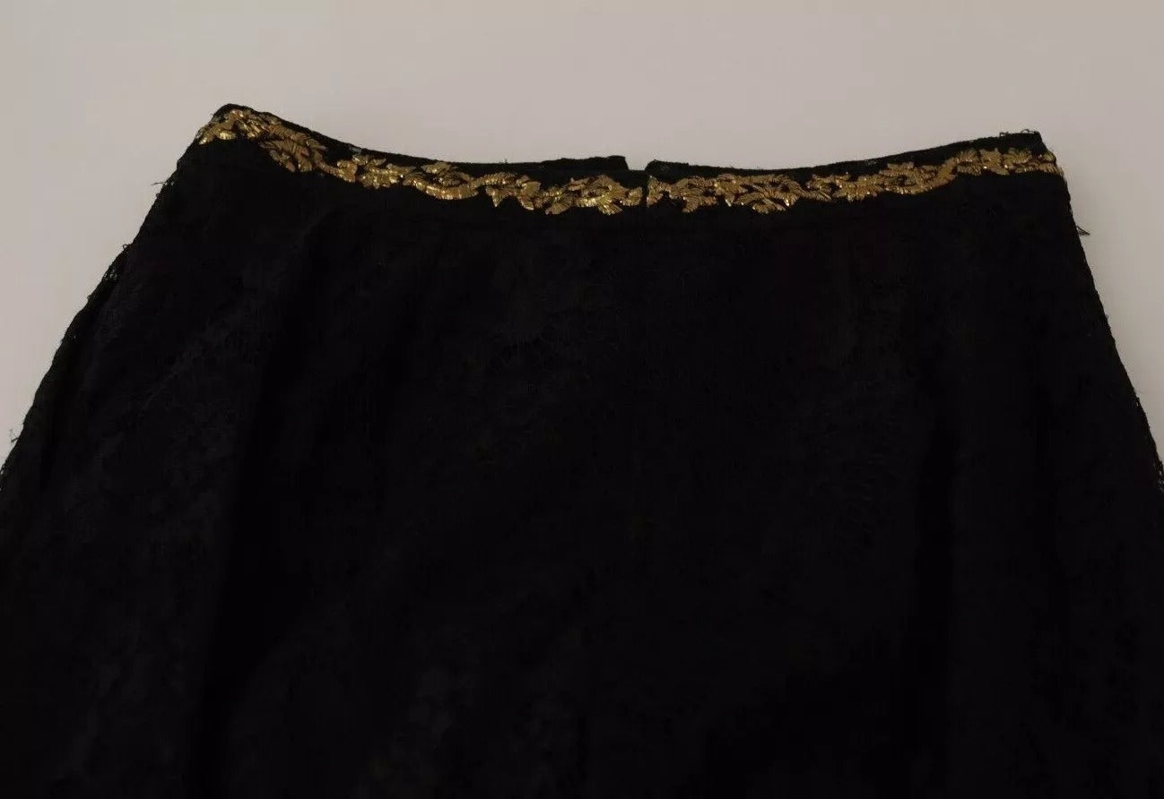 A black lace short with gold baroque detailing, part of a special collection by Dolce & Gabbana