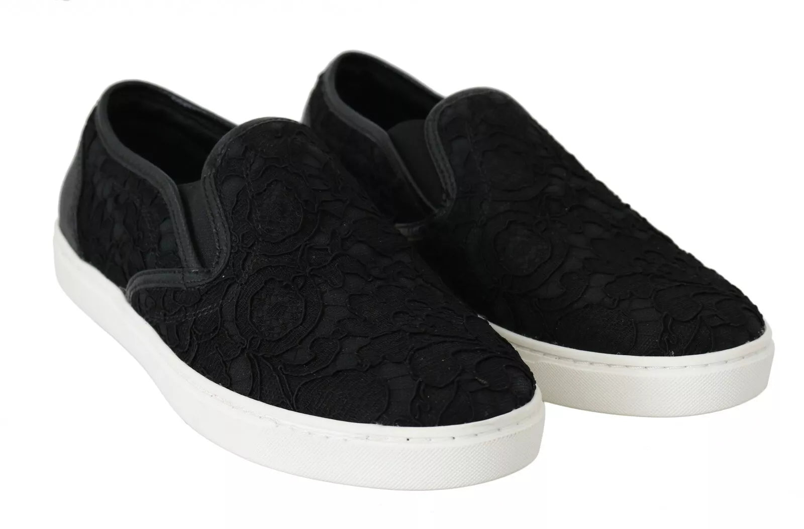 Pair of black lace-up slip-on shoes with white soles and a logo on the side
