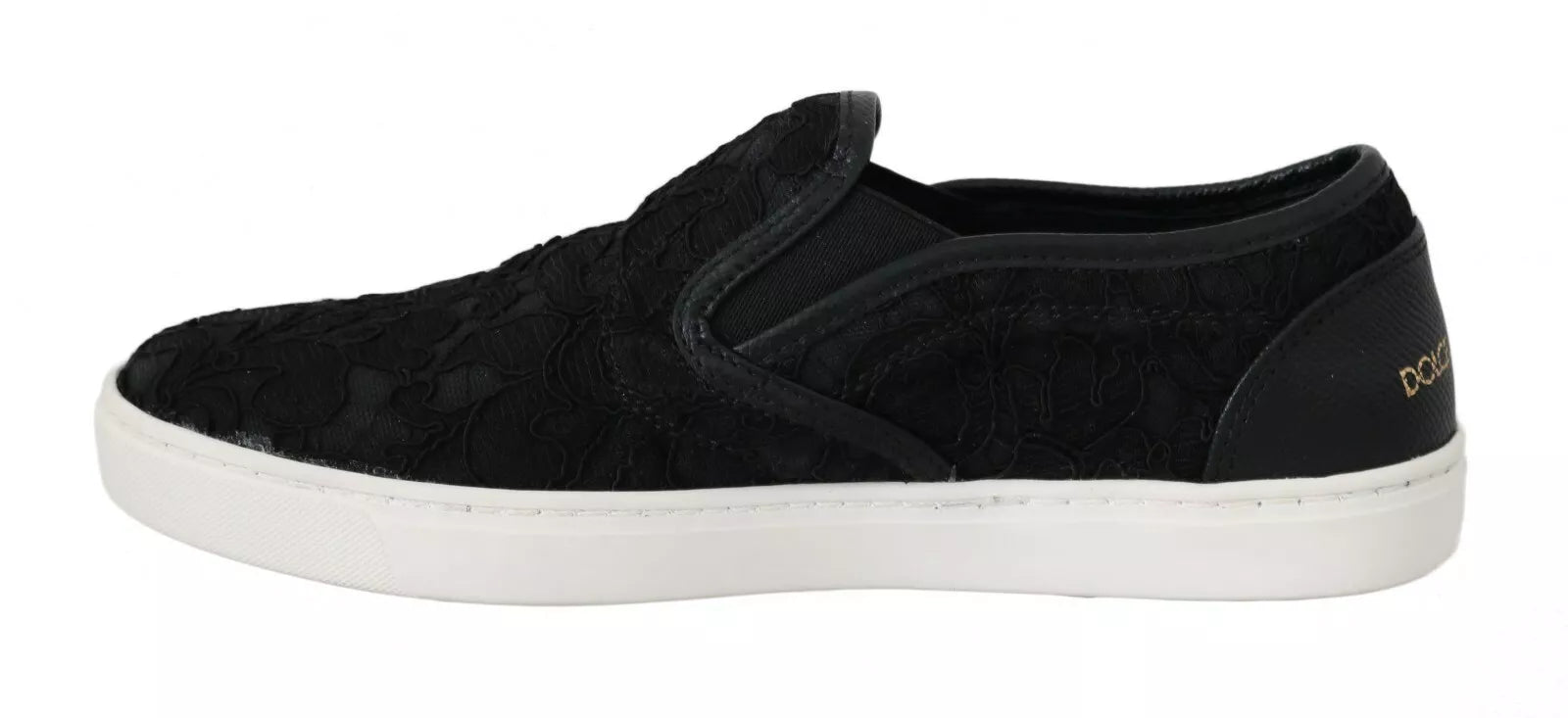 Black lace up slip on shoes with gold logo, featuring a leather upper and flat sole