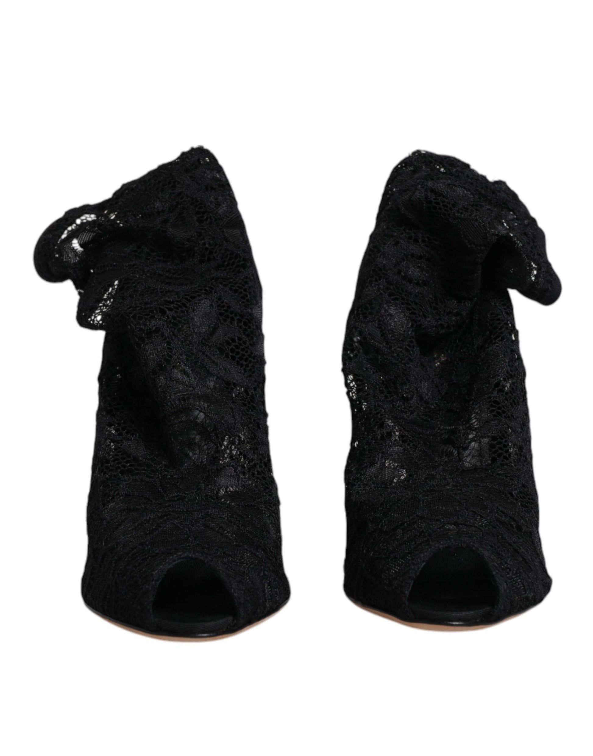 Pair of black velvet ankle boots with embellishments