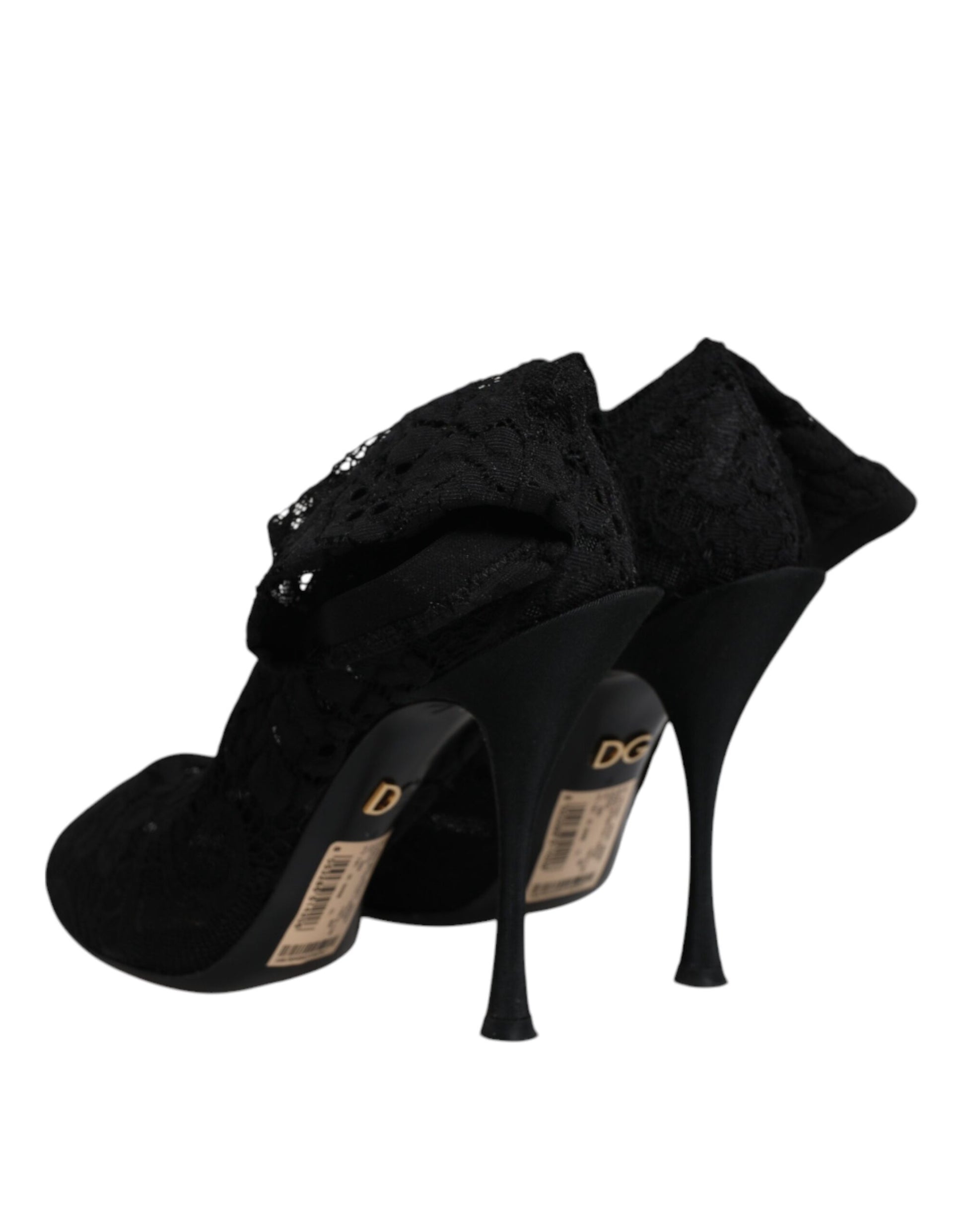 Pair of black high heel shoes with lace detailing
