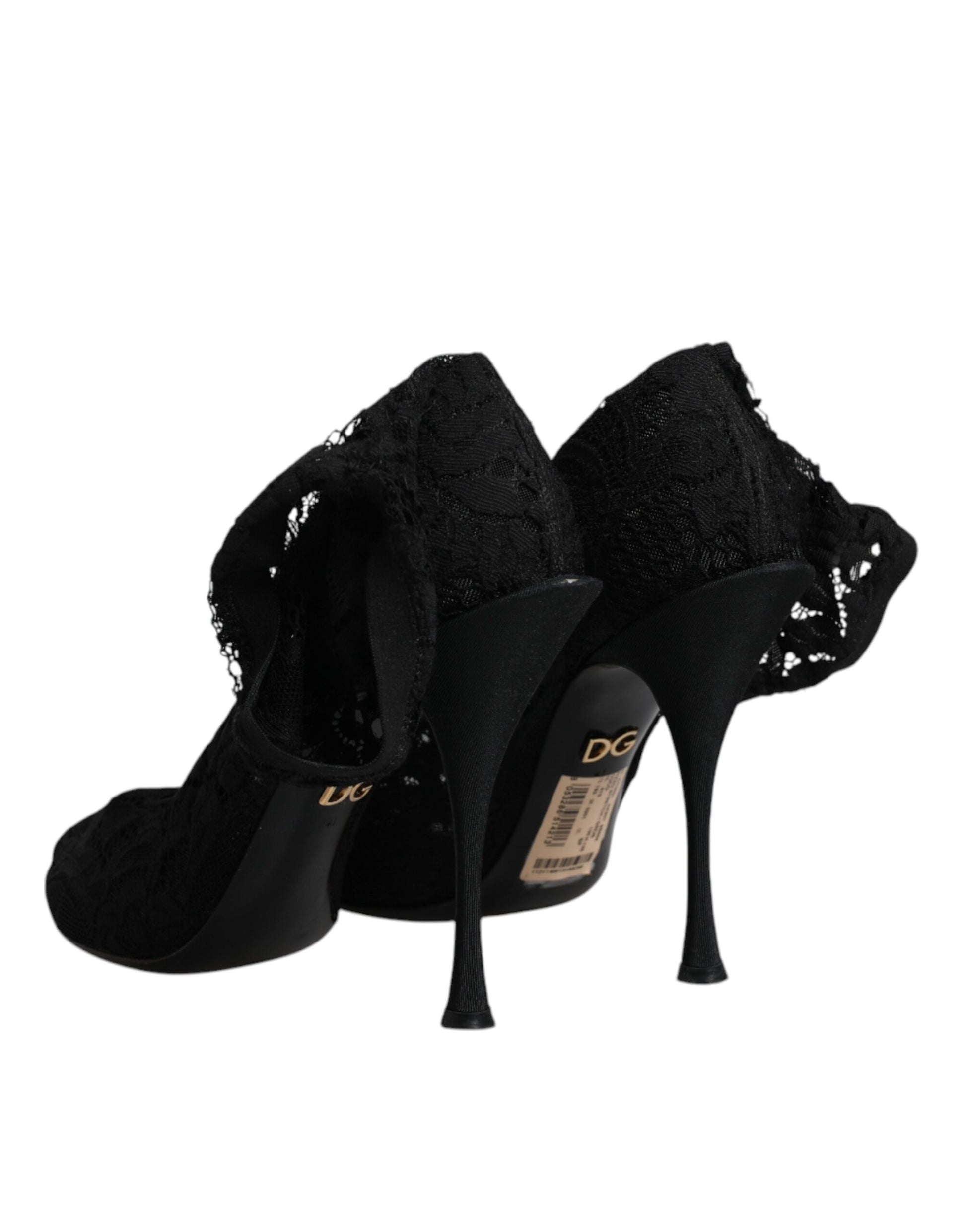Pair of black high heel shoes with lace detailing